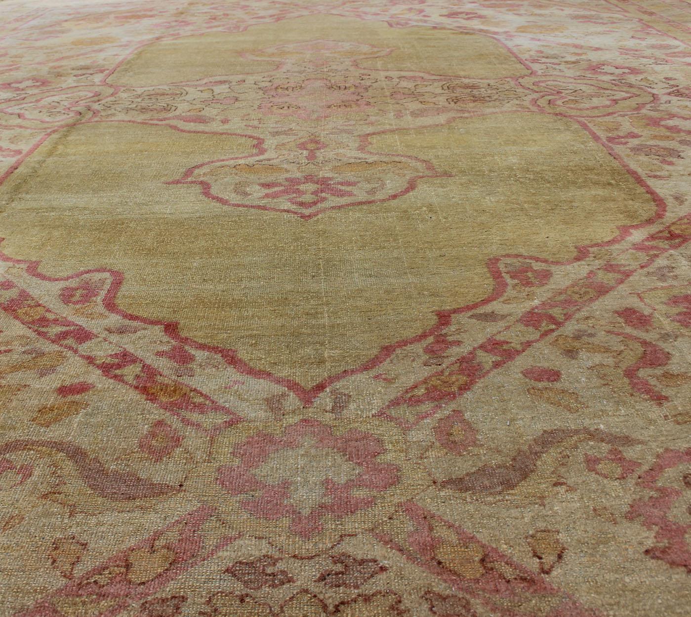 Wool Antique Amritsar Rug With Medallion Design in Acidic-Yellow Green, Pink, Ivory For Sale