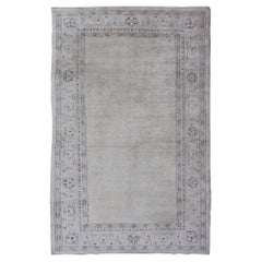 Antico tappeto indiano Amritsar con sfondo crema e bordo rosso e lavanda