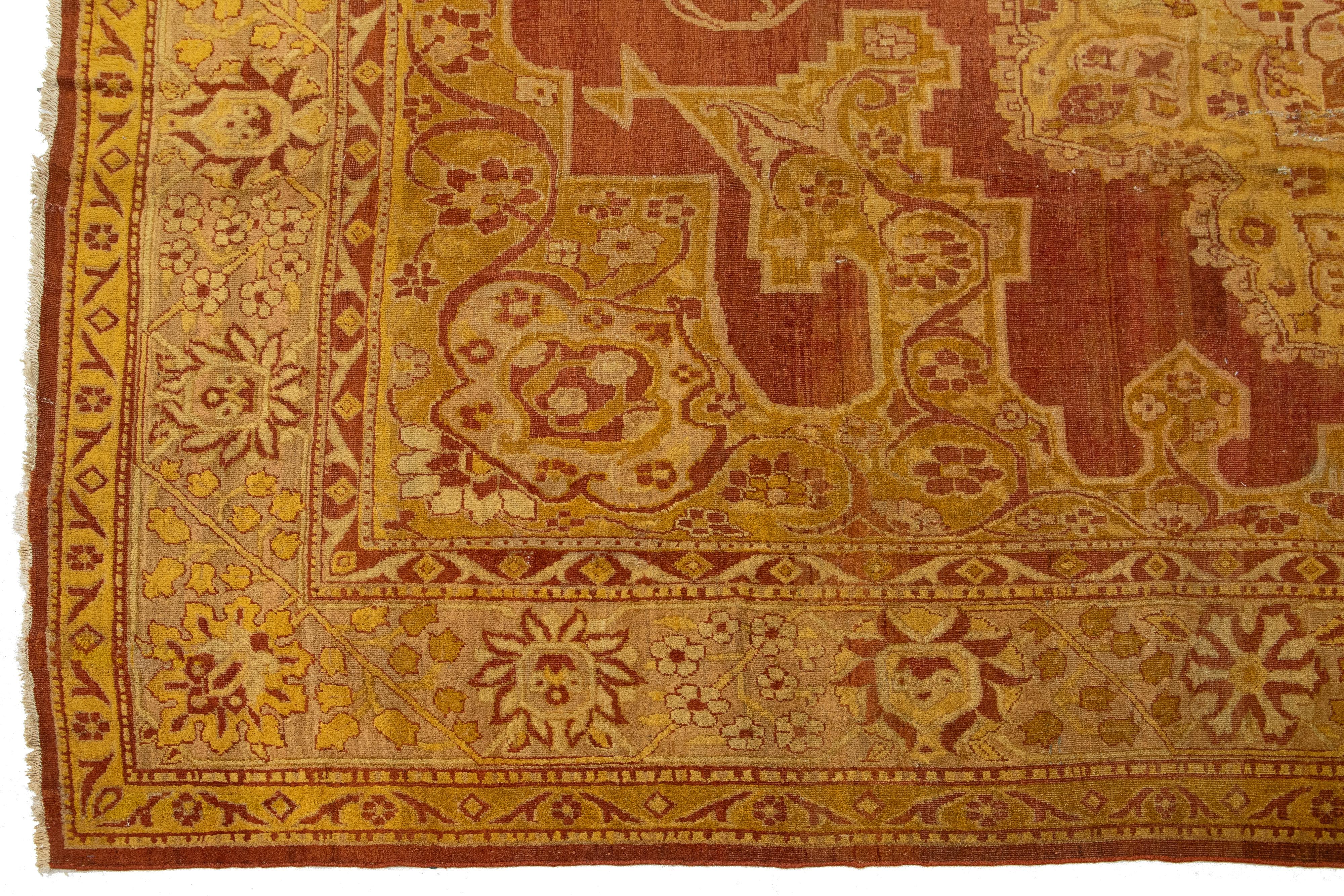 Antiker indischer Amritsar-Wollteppich, handgefertigt in Goldenrod mit Medaillon-Design (Wolle) im Angebot