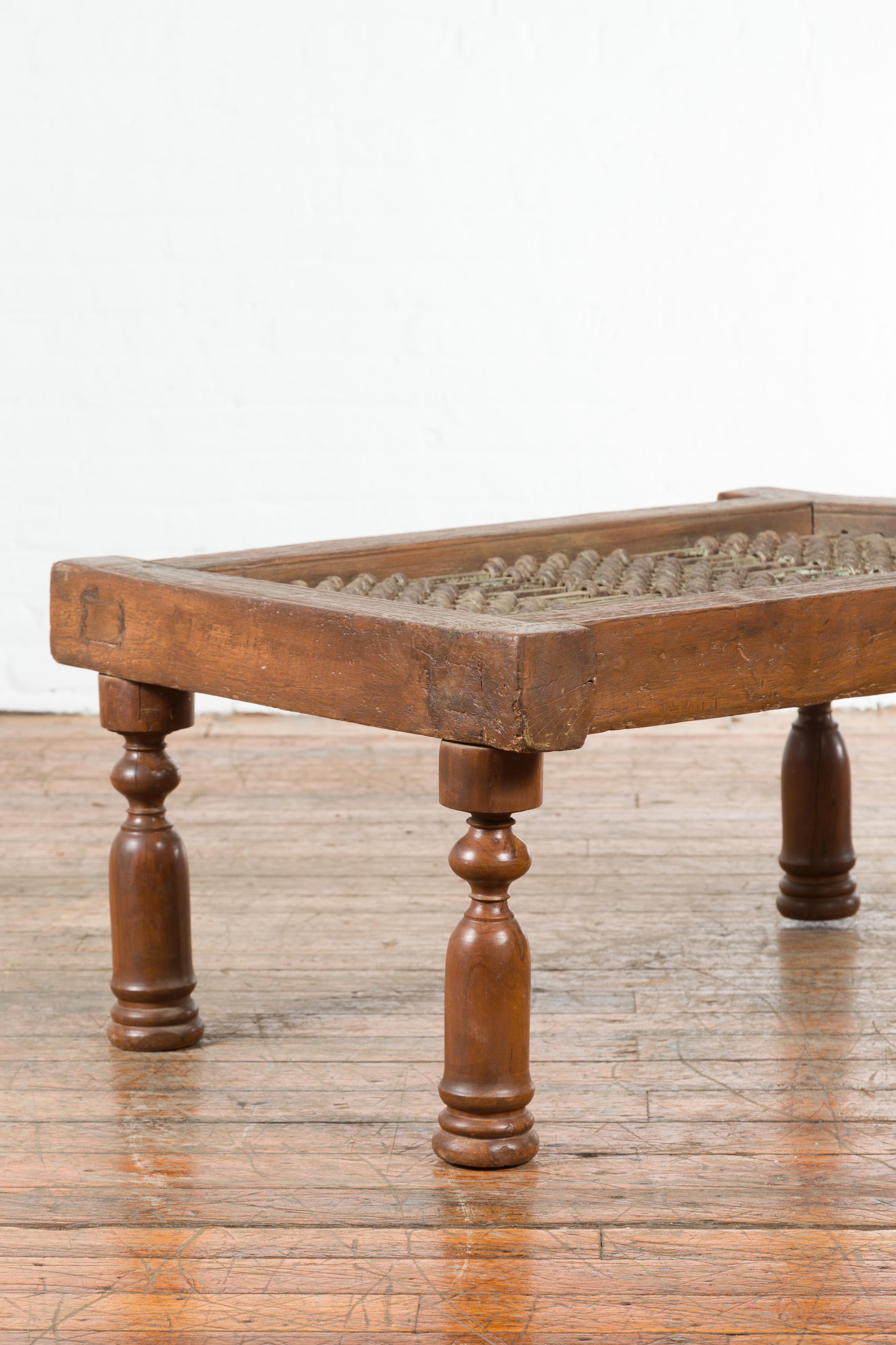 Metal Antique Indian Arched Window Grate Made into a Coffee Table with Baluster Legs For Sale