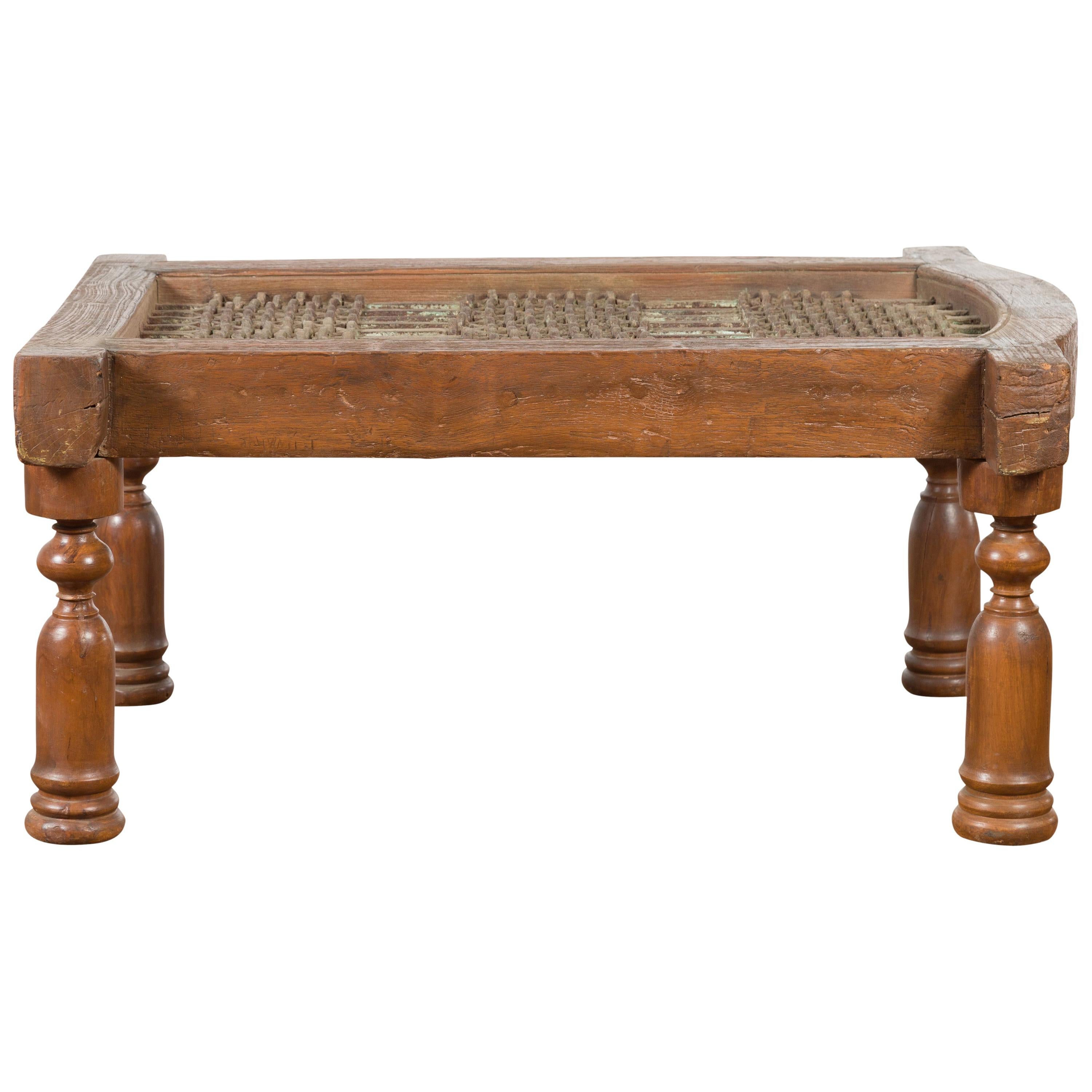 Antique Indian Arched Window Grate Made into a Coffee Table with Baluster Legs