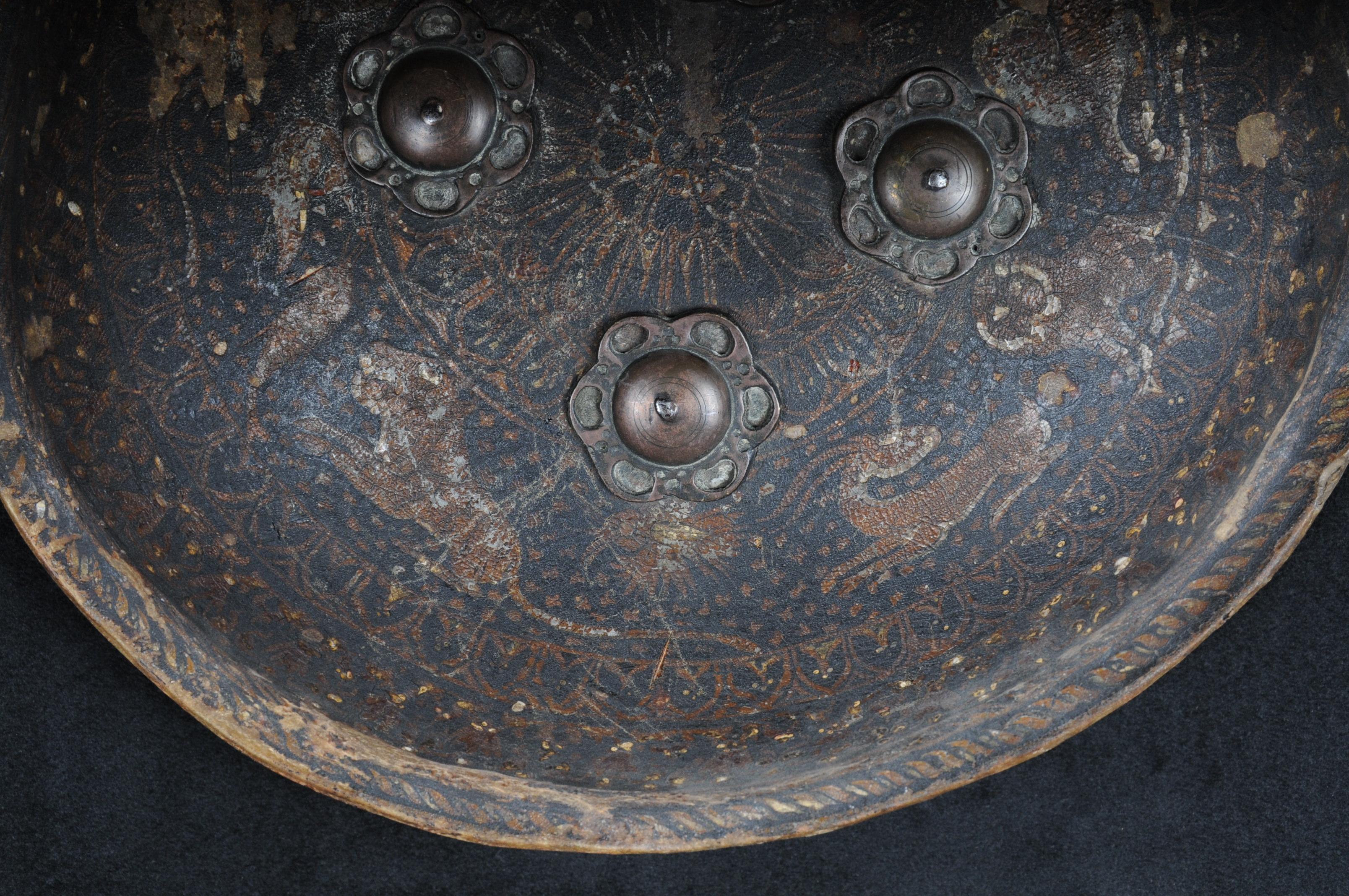 Old schield 
from India 
with bronze and leather 
verry rare 
19th century 

Antique Indian battle shield 19th century
Very old battle shield probably India. Arched round body. Unfortunately, age is not clearly identifiable, but we believe it