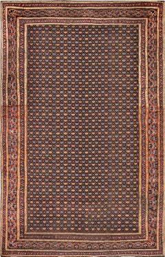 Ancien tapis indien en laine fait à la main