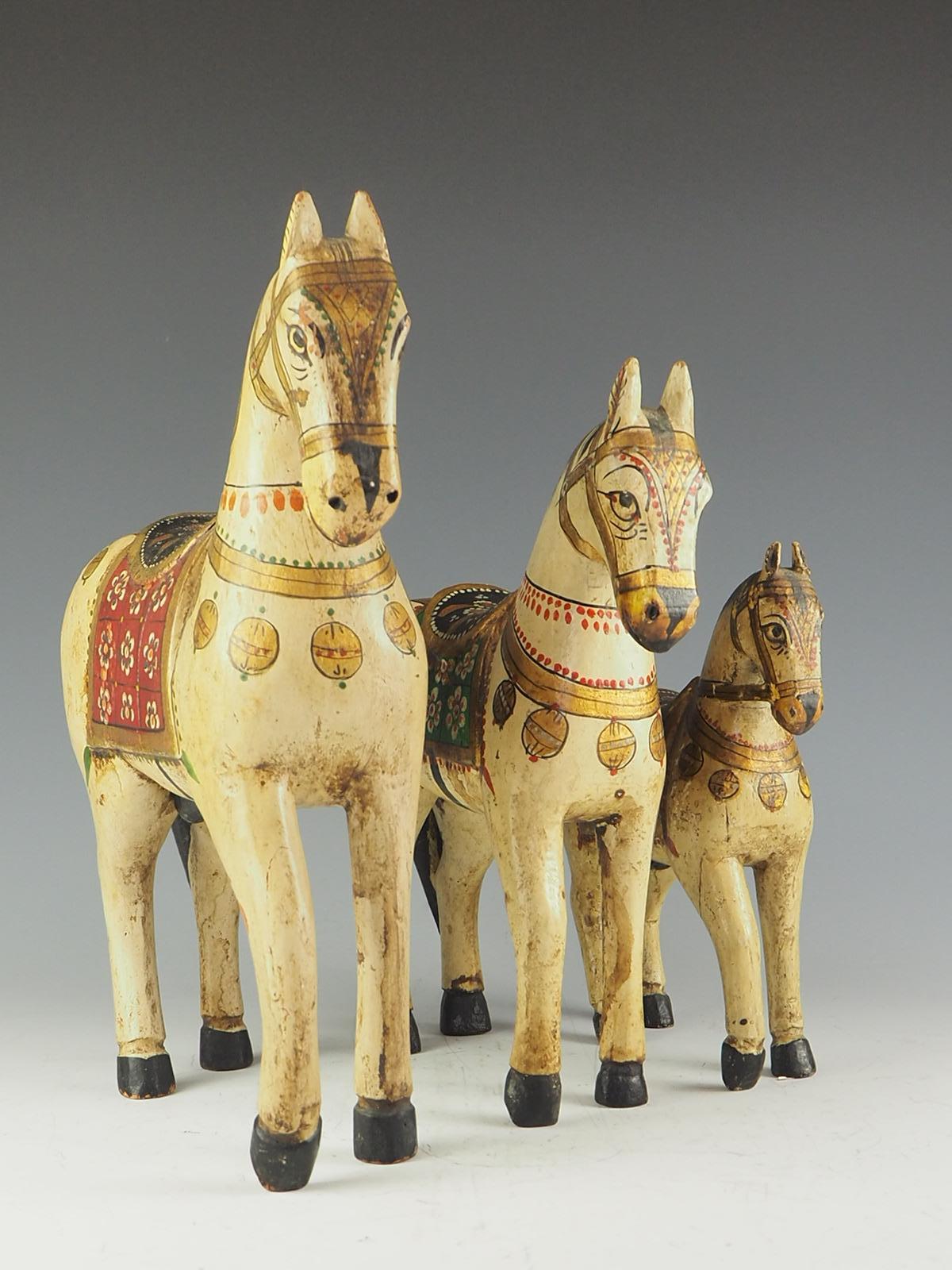 Set of Three Wedding Horses. These horses were carved by Rajhastani artisans around 1920s or earlier.

This is a very rare set of male and female and foal horses. The foal horse is also a male horse.