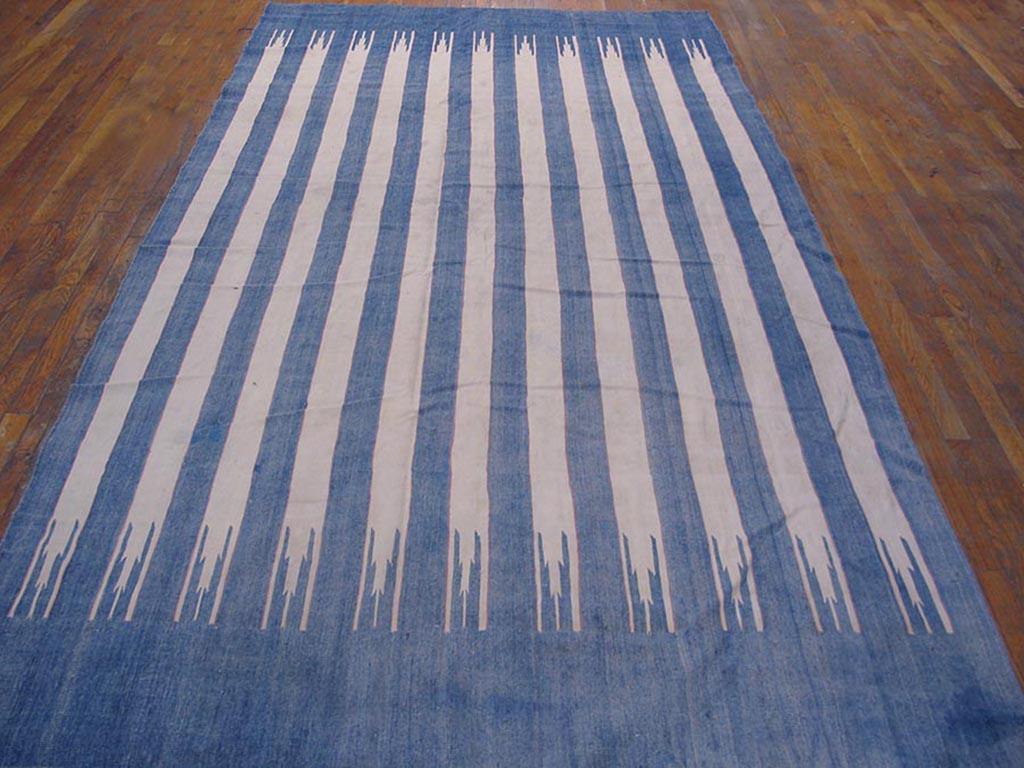 This long rug format cotton flat-weave shows eleven vertical (!) off-white stripes with split ends, all set on the delightful, denim blue ground. Clear figure/ground distinction. Vintage to antique, good condition.