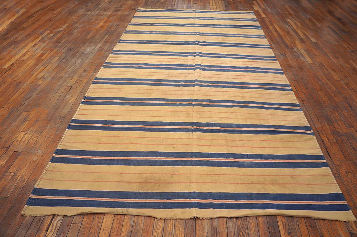 Pairs of blue bands are separated by ecru panels with hairline brown accents. Good condition. All-cotton, tapestry weave Indian piece. 
Measures: 6'6