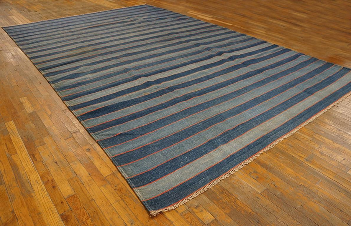 The dark blue stripes are individually abashed and subtle wend their way across this long-format flat woven carpet whose size can be adjusted to fit any appropriate space. Good condition on this antique all-cotton piece.