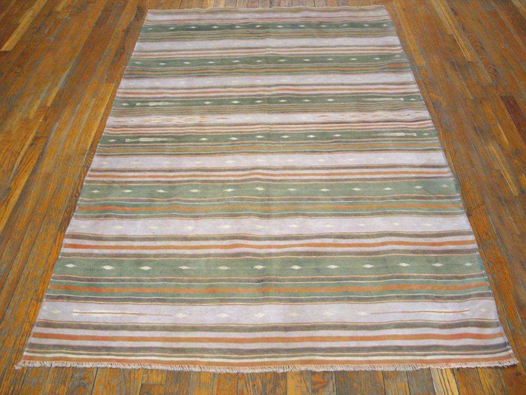 There are six wide, multiply-striped, and a run of very narrow stripers at each end. Finely woven, all-cotton construction and very versatile as a scatter or accent piece. Good condition. Measures: 4'0