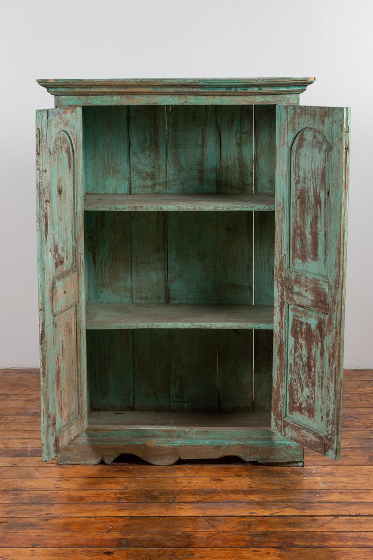 Indian Distressed Green Painted Wooden Wardrobe with Red