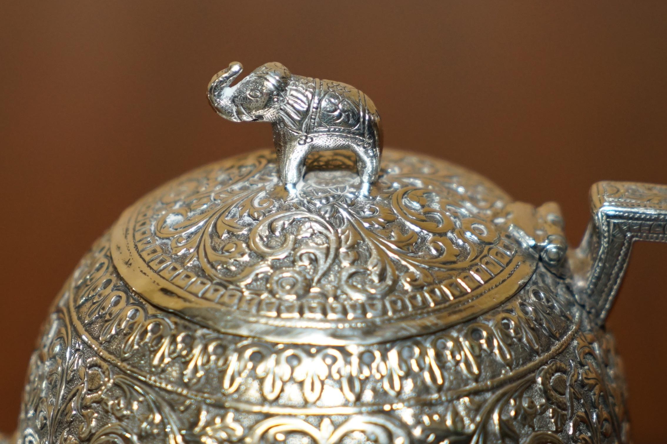 Hand-Crafted ANTIQUE INDIAN ELEPHANT COLONIAL SOLiD SILVER TEA SERVICE OOMERSI MAWJI & SONS For Sale