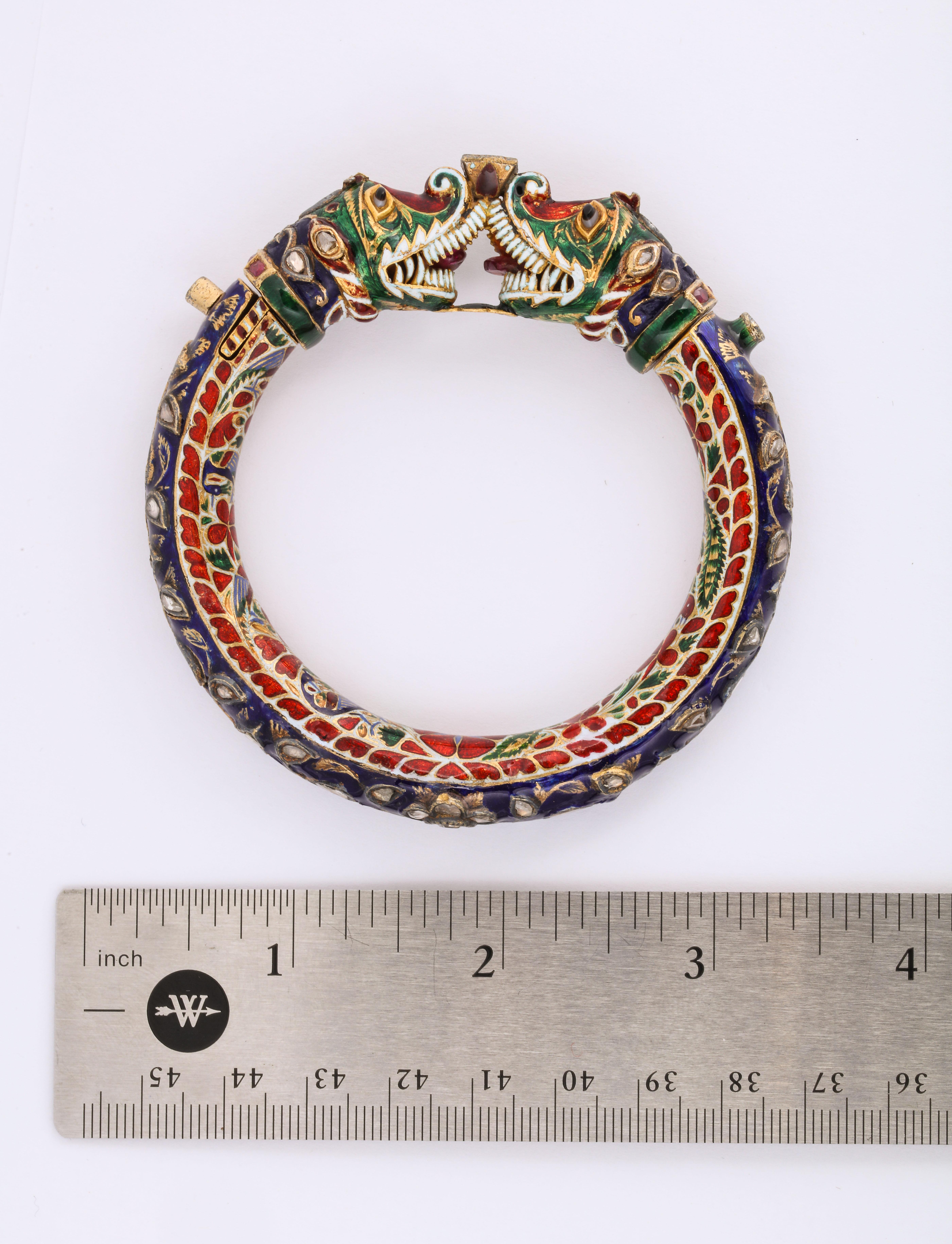 Exceptional 19th century Antique hand painted enamel and rose cut diamond bangle bracelet

Made circa 1850

22 Karat gold