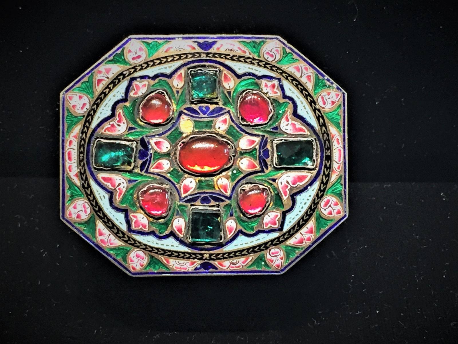 Unmarked. 
Weight: 3 ounces.

This amazingly beautiful precious 19th century bauble from India is an octagonal silver casket, completely covered with hand-painted ornamental and miniature multicolored enamels and features a gilded interior.