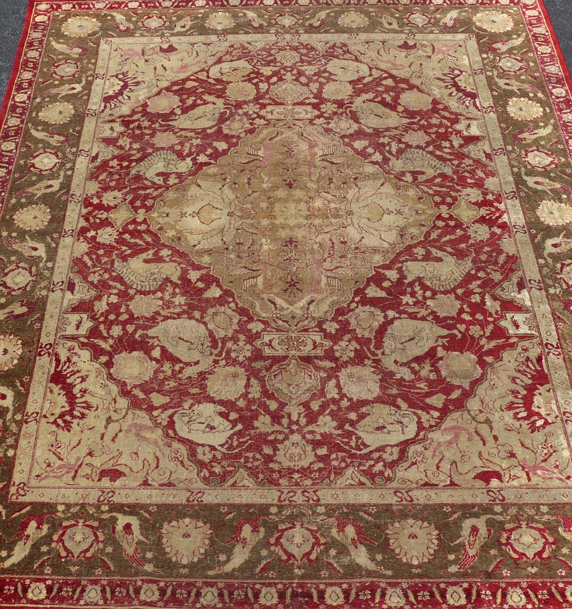 Antique India Agra Rug from the end of Mughal Empire period/ remanent of the Mughal whom ruled most of the Asia. This 18th century Indian rug displays a Central Medallion Design in wine Red, Green, Camel and Tan. Keivan Woven Arts / rug X23-0304,