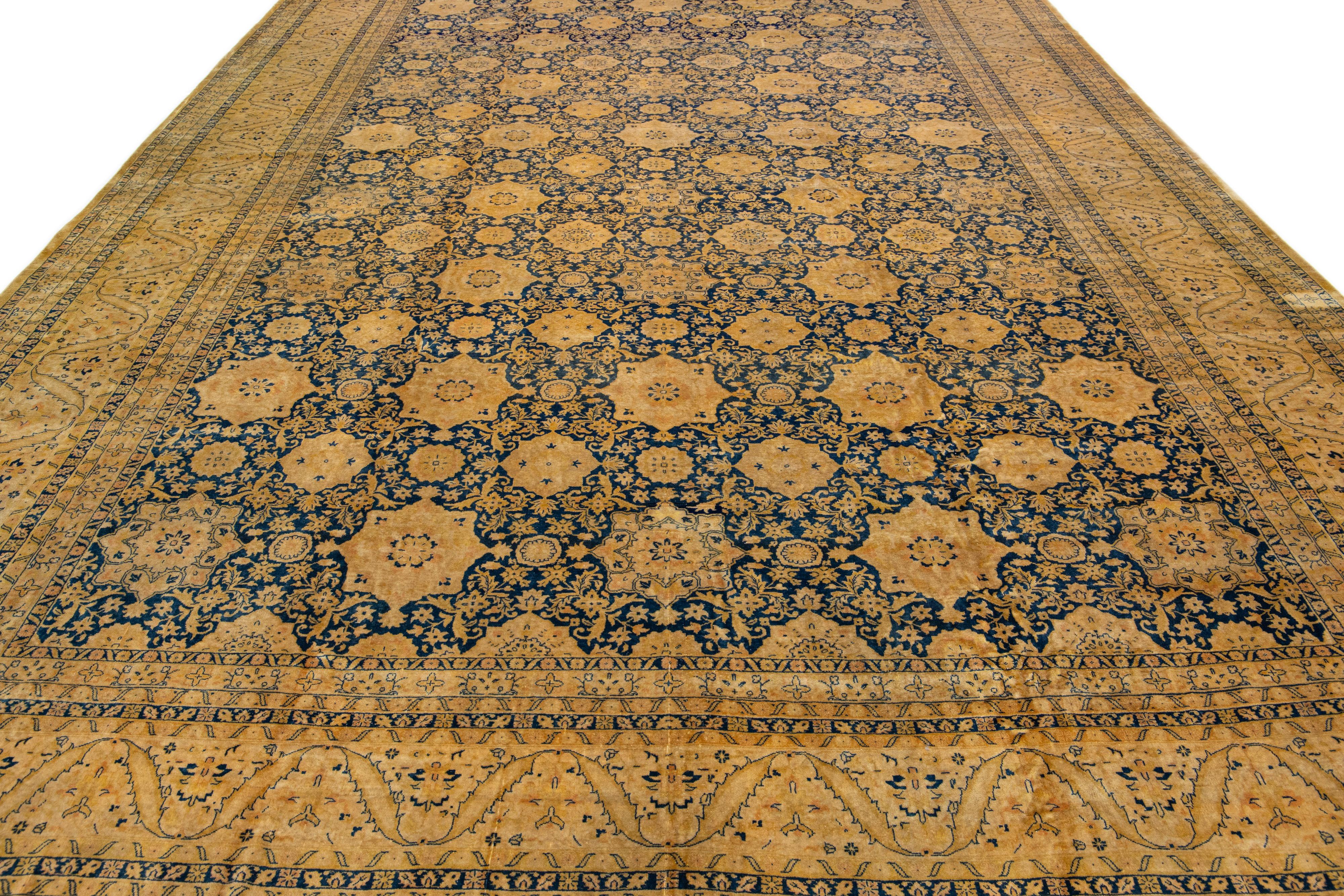 Anglo-Indian Antique Indian Handmade Blue Wool Rug with Allover Rosette Design For Sale