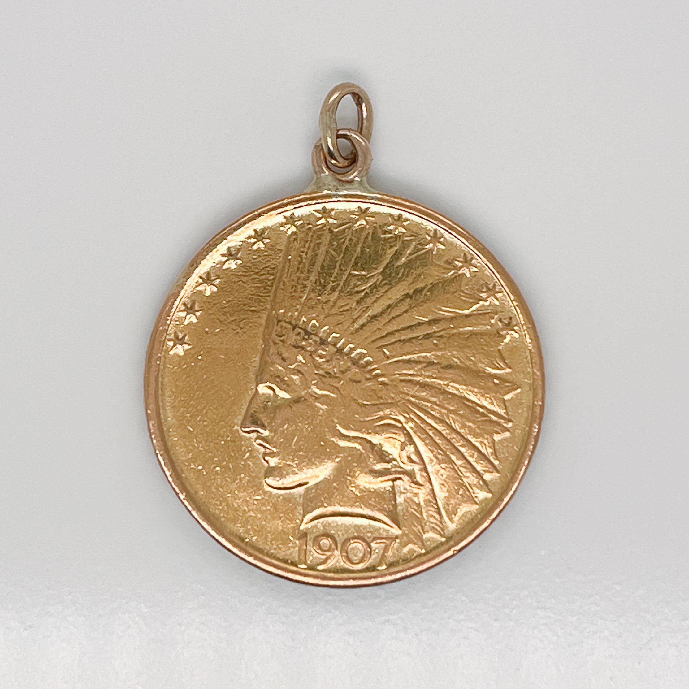 A very fine antique gold coin pendant.

Made from a $10 gold coin that dates to 1907.

Simply a wonderful Numismatic pendant - both a beautiful and amazing piece of history!

Date:
20th Century

Overall Condition:
It is in overall good, as-pictured,
