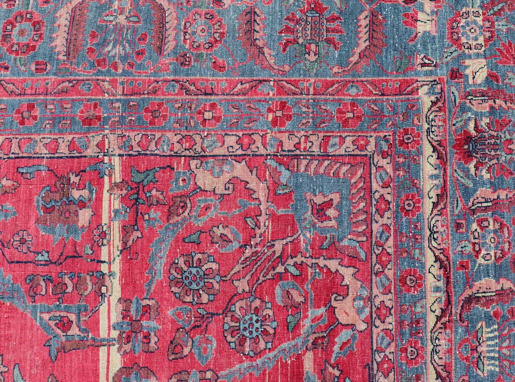 Antique Indian Lahore large carpet with floral design in soft magenta and blue. Keivan Woven Arts / 11-20530, circa 1910, Lahore carpet.
Measures: 10'6 x 16'0 
This finely woven gorgeous antique Indian Lahore, with its all-over floral pattern,