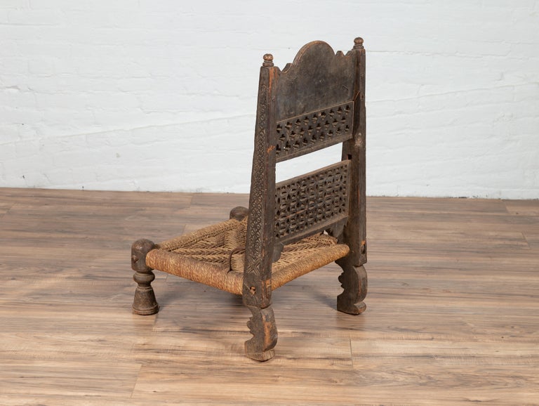 Antique Indian Rustic Low Seat Wooden Chair with Fretwork Accents and