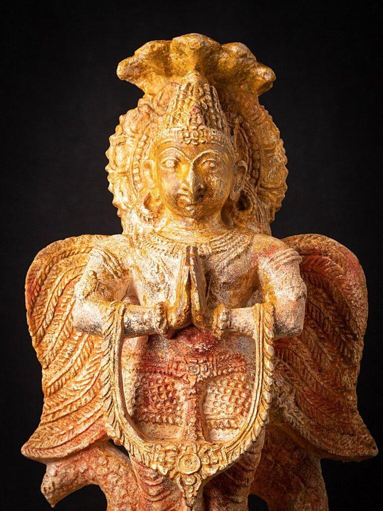 Material: Sandstone
Material: wood
62 cm high 
33 cm wide and 21,5 cm deep
Weight: 29.3 kgs
Originating from India
19th century
Can be shipped worldwide.
 