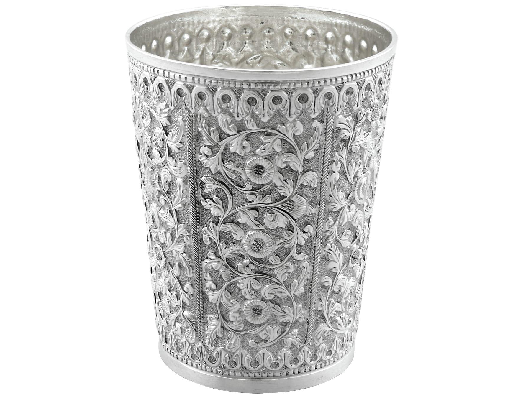 An exceptional, fine and impressive antique Indian silver beaker; an addition to our range of drinks related silverware

This exceptional, fine and impressive antique Indian silver beaker has a cylindrical tapering form.

The surface of the