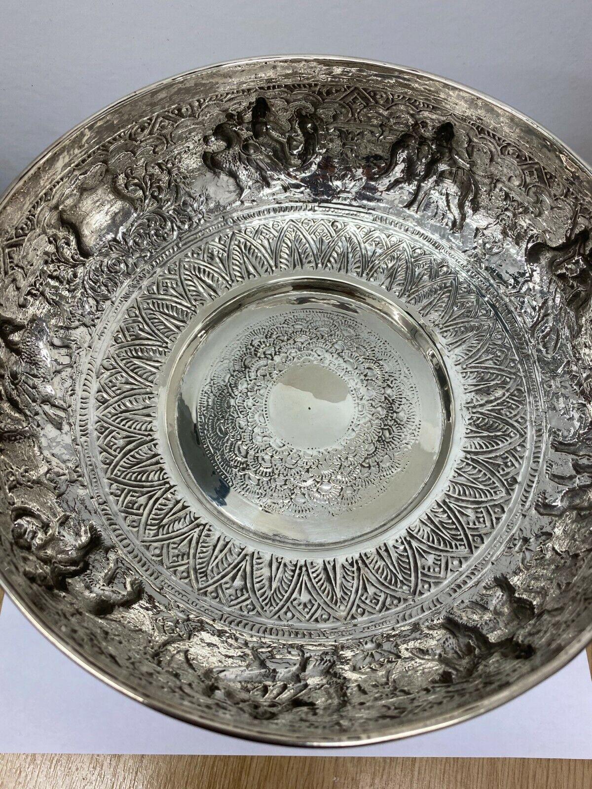 Antique Indian Lucknow Silver Repousse Hunting Scenes Pedestal Bowl or Trophy

In excellent condition. A late 19th or early 20th century Raj period silver bowl from India. It is of pedestal form and has a vacant shield suggesting it was intended as