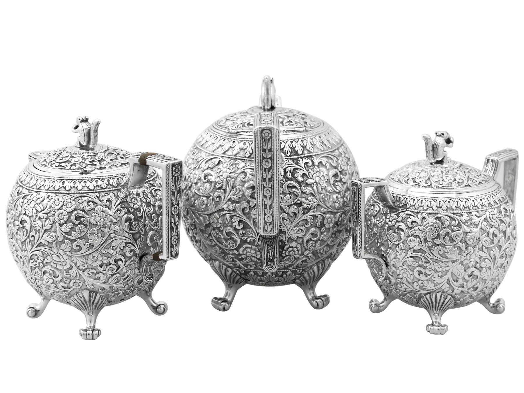 An exceptional, fine and impressive antique Indian silver three piece tea service made by Oomersee Mawjee & Sons; an addition to our diverse silver teaware collection.

This exceptional antique Indian silver tea service/set consists of a teapot,