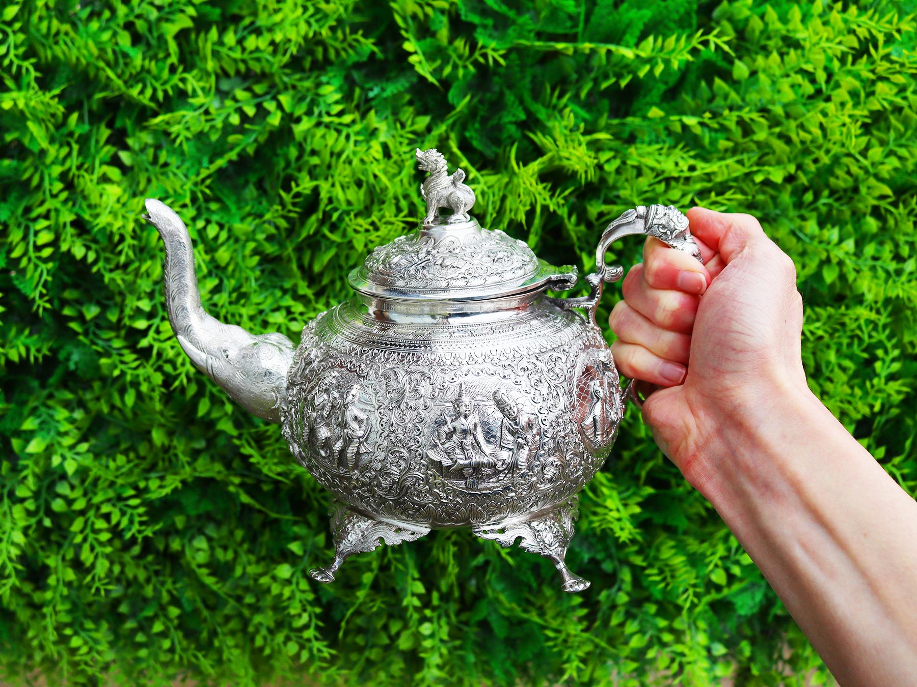 A exceptional, fine and impressive antique Indian silver three piece tea service; an addition to our diverse silver teaware collection.

This exceptional antique Indian silver tea set/service consists of a teapot, cream jug and sugar bowl.

Each
