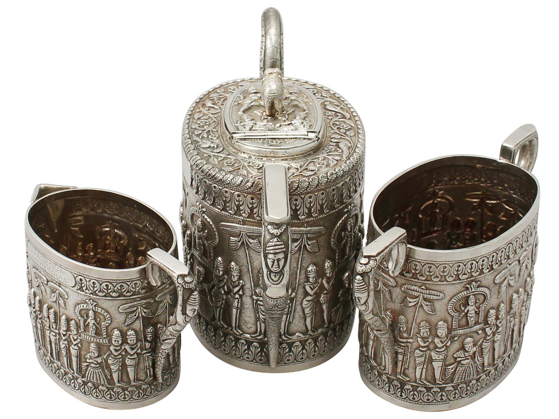 An exceptional, fine and impressive antique Indian sterling silver four piece tea service; an addition to our diverse silver teaware collection.

This exceptional antique Indian sterling silver four piece tea service or set consists of a spirit