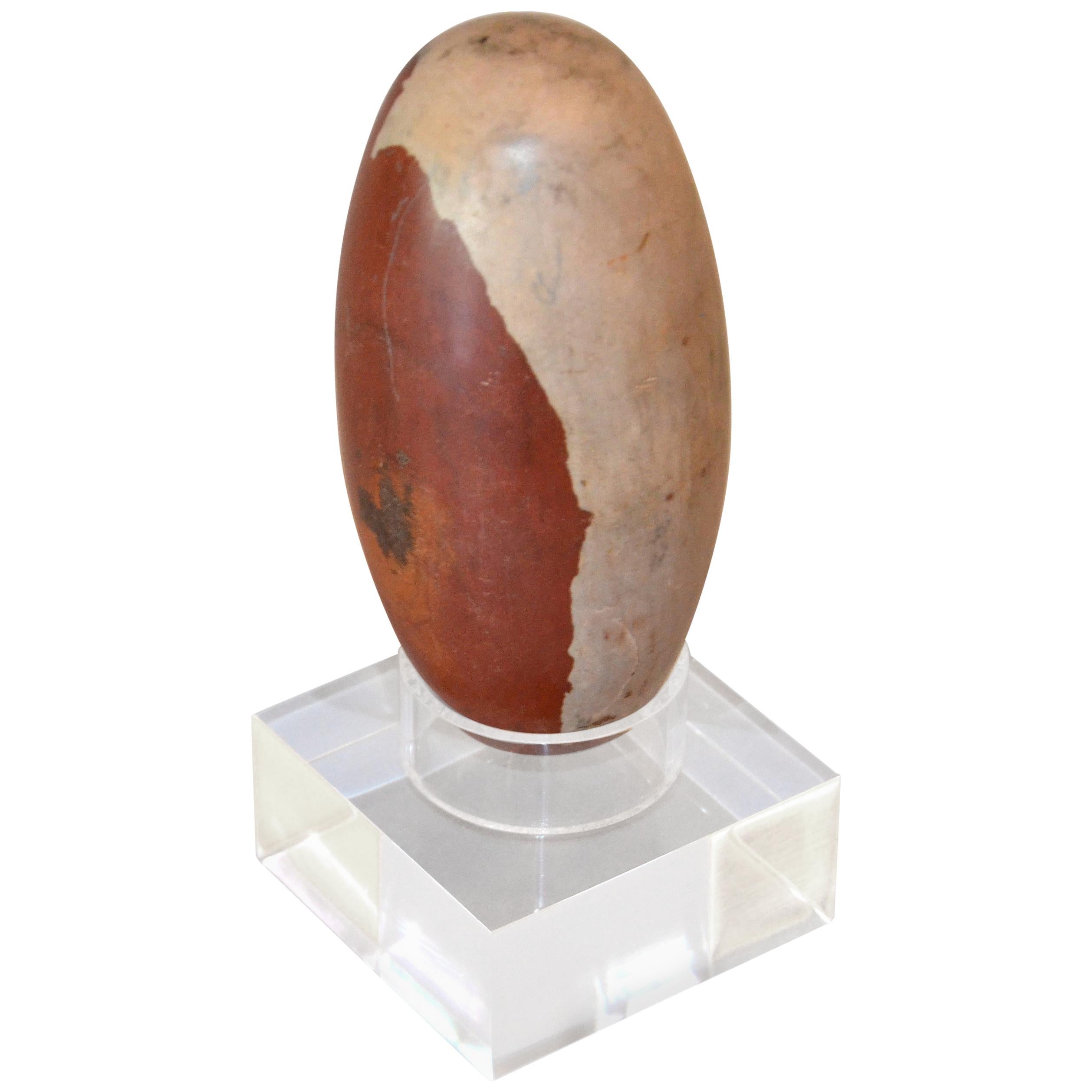 Antique Indian Tantric Shiva Lingam Stone on a Clear Lucite Stand For Sale