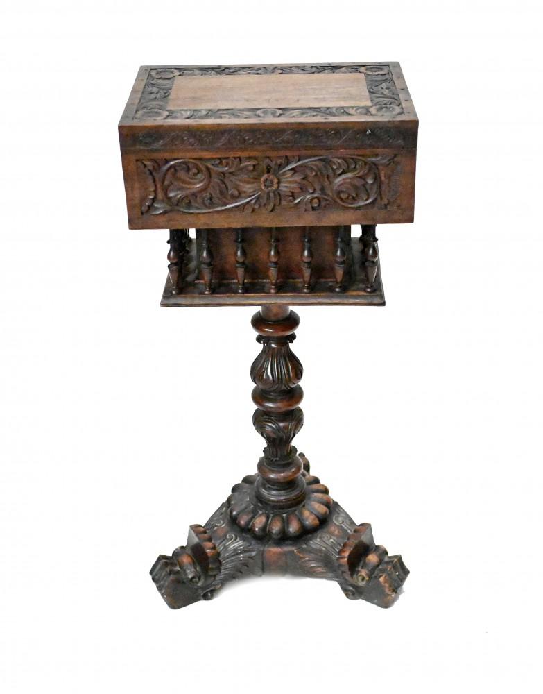 A padouk wood teapoy finely carved on an elaborate tri form base terminating a paw feet
Teapoy - a small three-legged table or stand, especially one that holds a tea caddy
Incredibly detailed carving with rosettes and floral motifs
We date this to