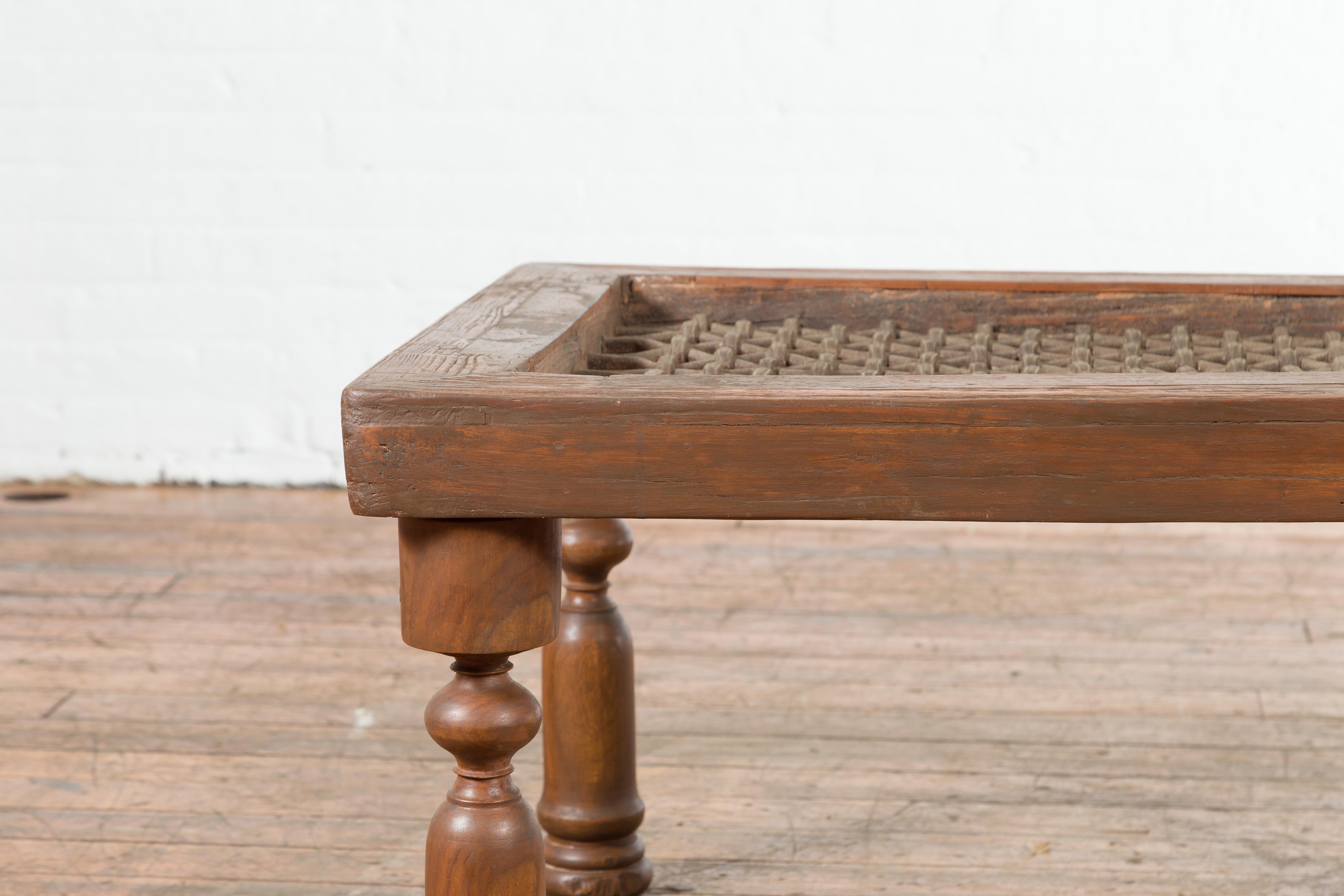 Metal Antique Indian Window Grate Made into a Coffee Table with Turned Baluster Legs For Sale