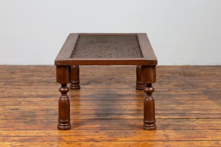 20th Century Antique Indian Wooden Coffee Table with Window Grate and Turned Baluster Legs