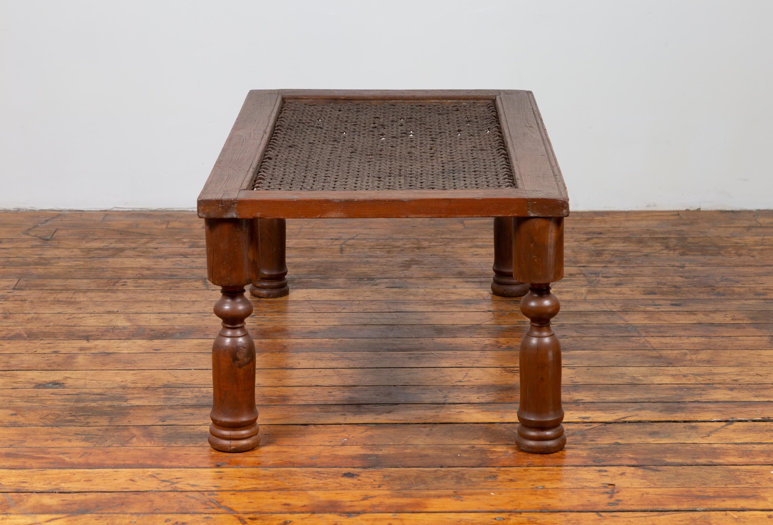 20th Century Antique Indian Wooden Coffee Table with Window Grate and Turned Baluster Legs