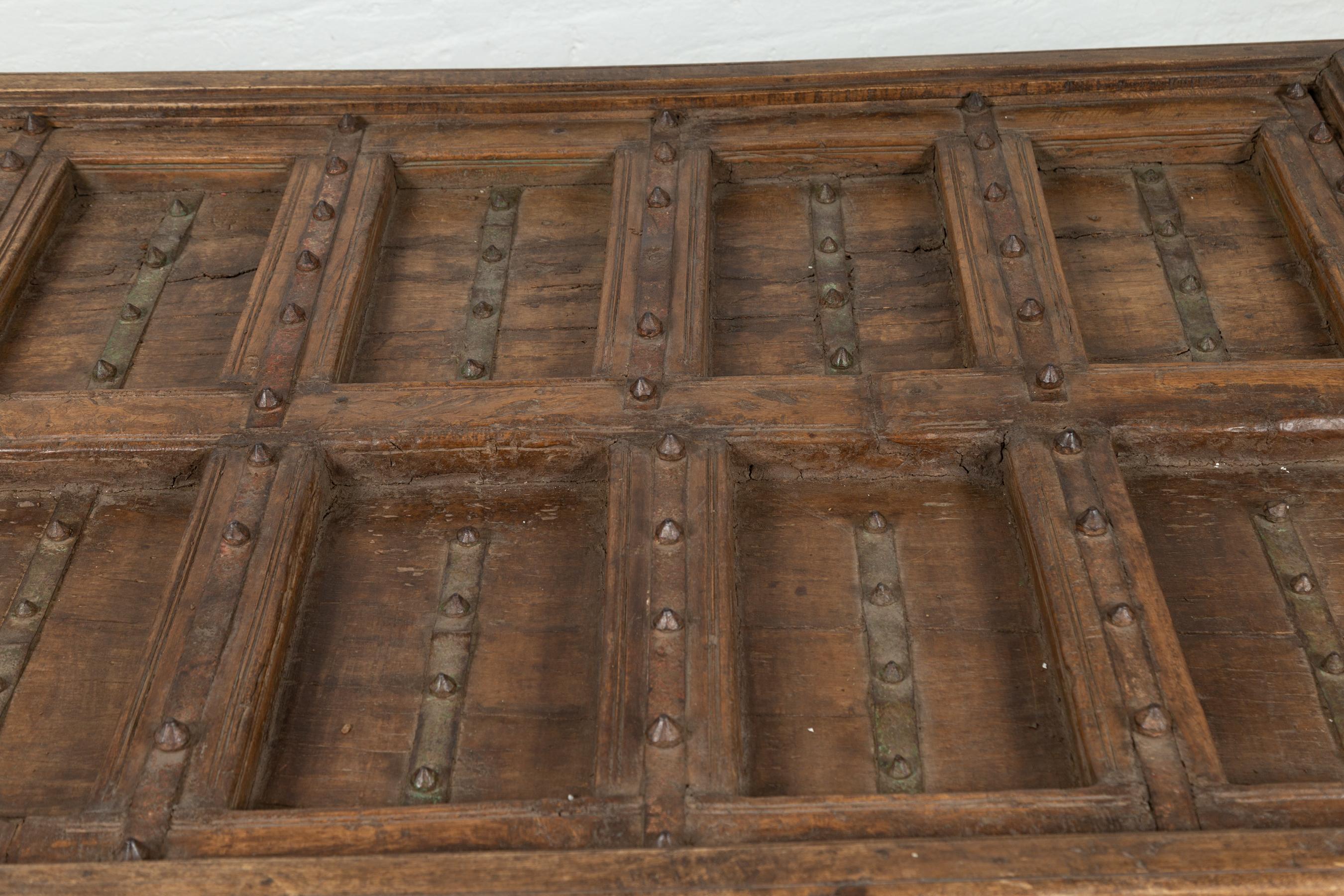 20th Century Antique Indian Wooden Palace Door Made into a Coffee Table with Iron Braces