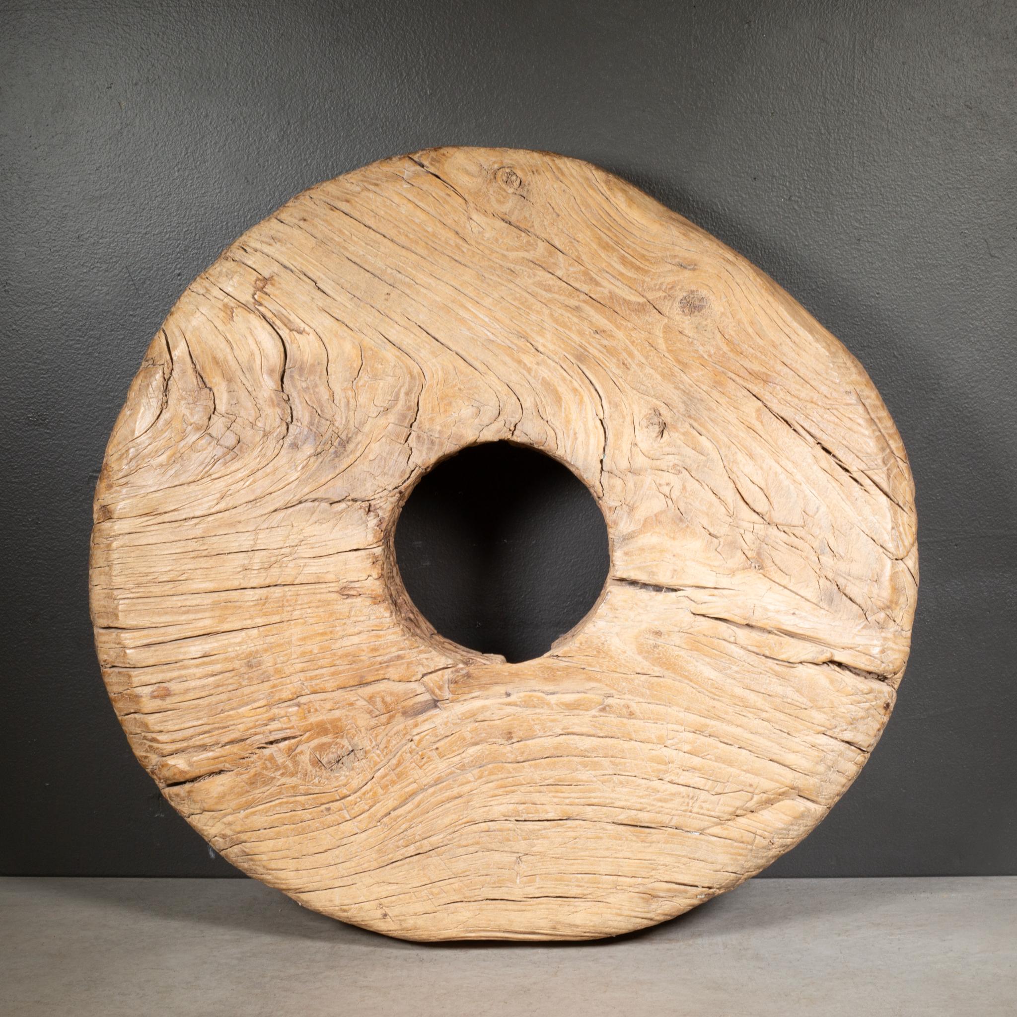 ABOUT

Antique wood wheel from India. Possibly a grinder wheel. Great unique piece with character and history for display indoors or out.

    CREATOR Unknown. 
    DATE OF MANUFACTURE c.1800-1940.
    MATERIALS AND TECHNIQUES Wood. 
    CONDITION