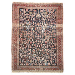 Alfombra antigua Indigo Blooming Jungle Heriz , circa 1920
s