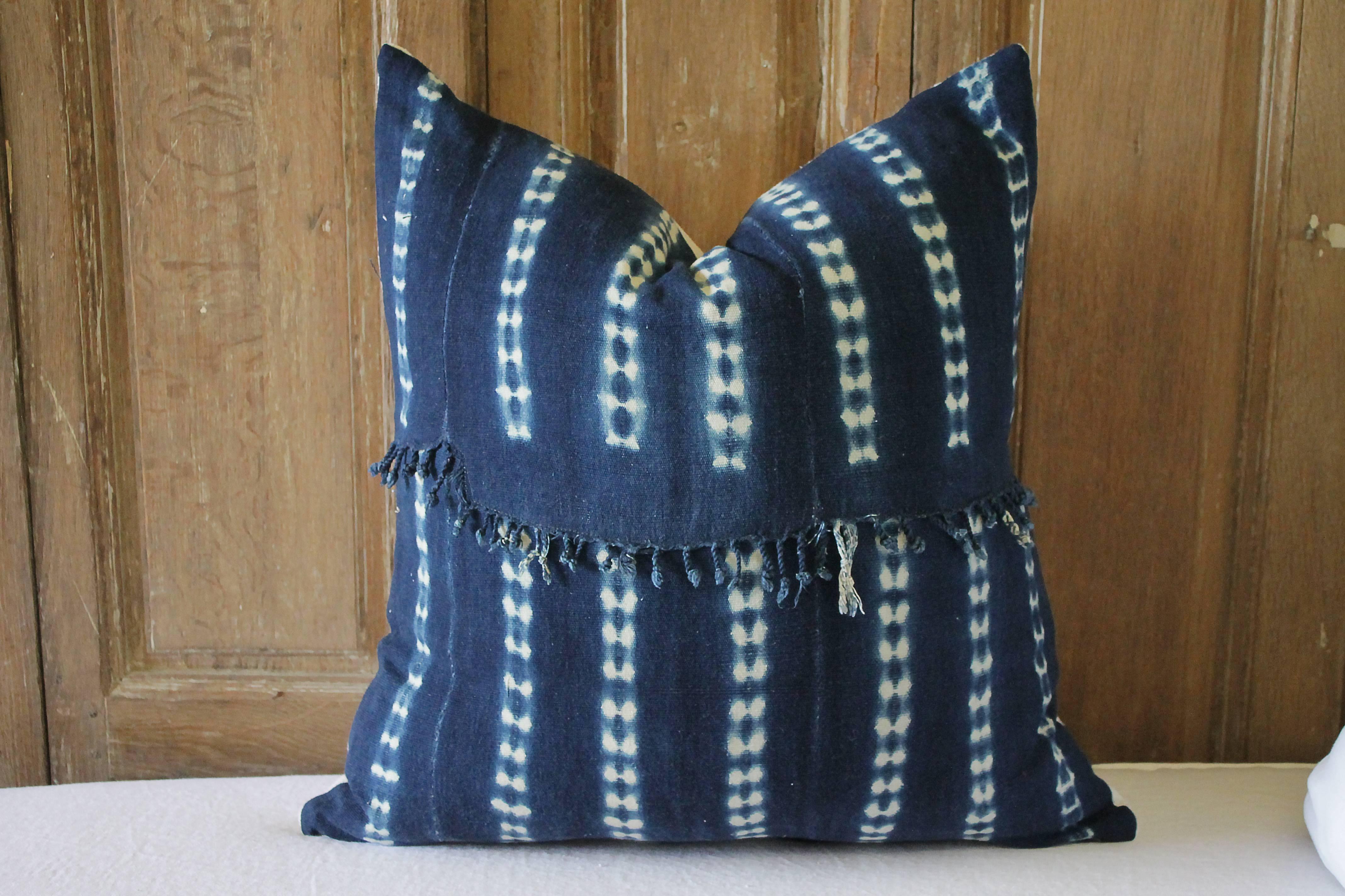 Antique indigo blue Batik accent pillows with fringe.
Custom-made by Full Bloom Cottage, the fronts of the pillows are in an antique Batik fabric with original fringe edge we salvaged from the throw, very soft and nubby, the backside are finished