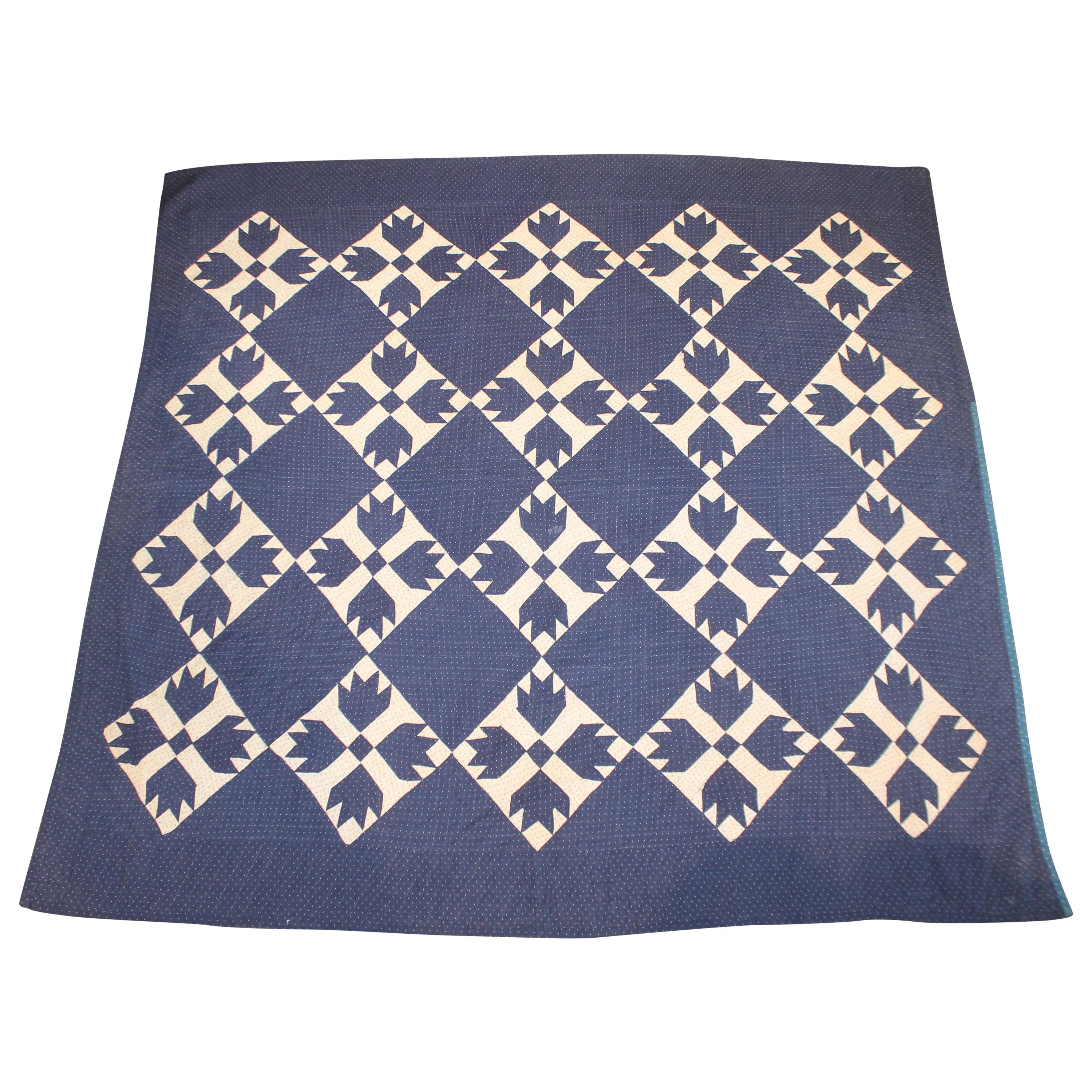 Antique Indigo Blue Quilt in Bear Paw Pattern