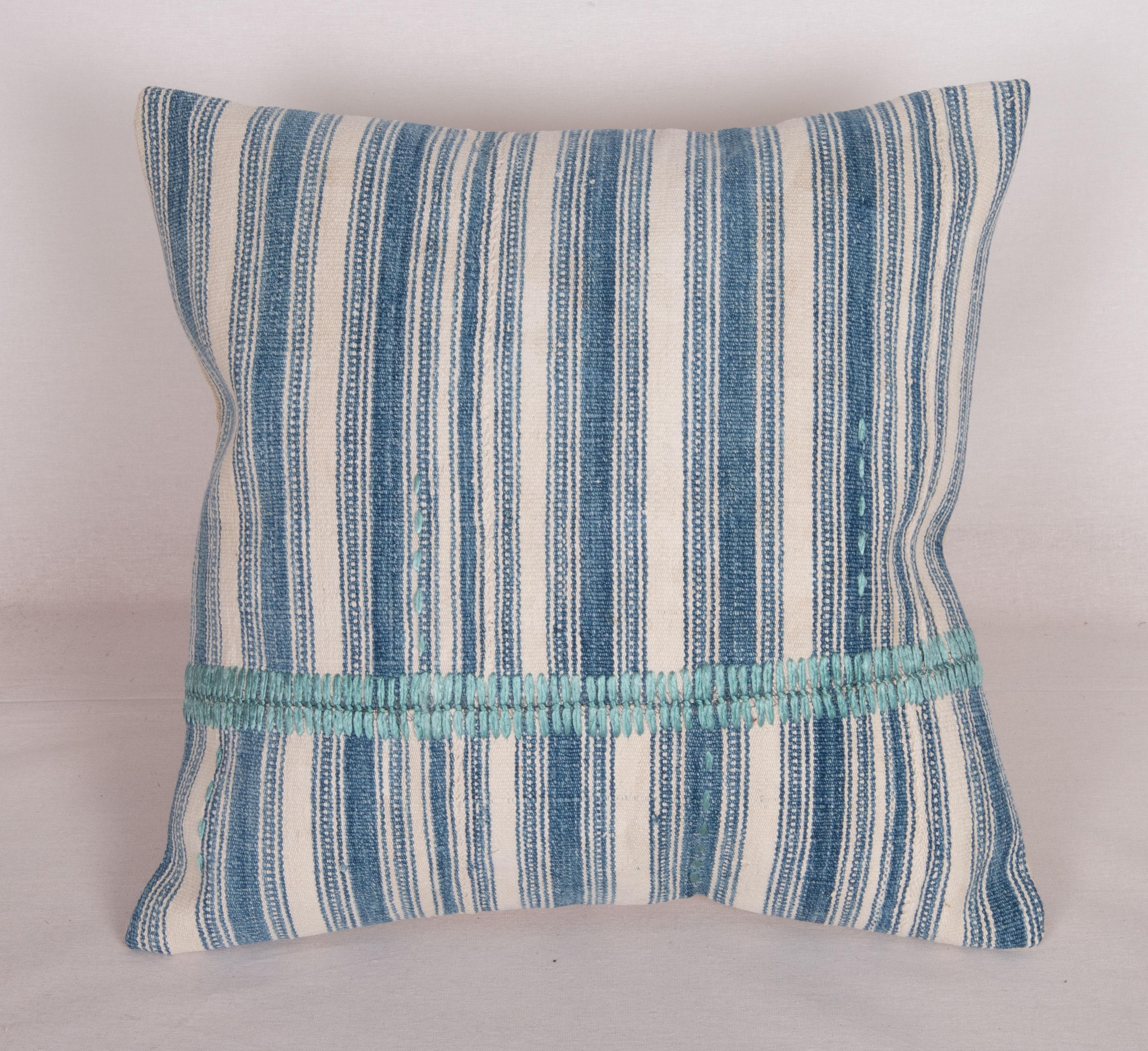 Pillow Cover was made from an antique cotton stripped kilim. The stitching is hand done in silk in our studio.
It does not come with an insert.
Linen in the back.
Zipper Colsure.
Dry Celaining is reccommended.