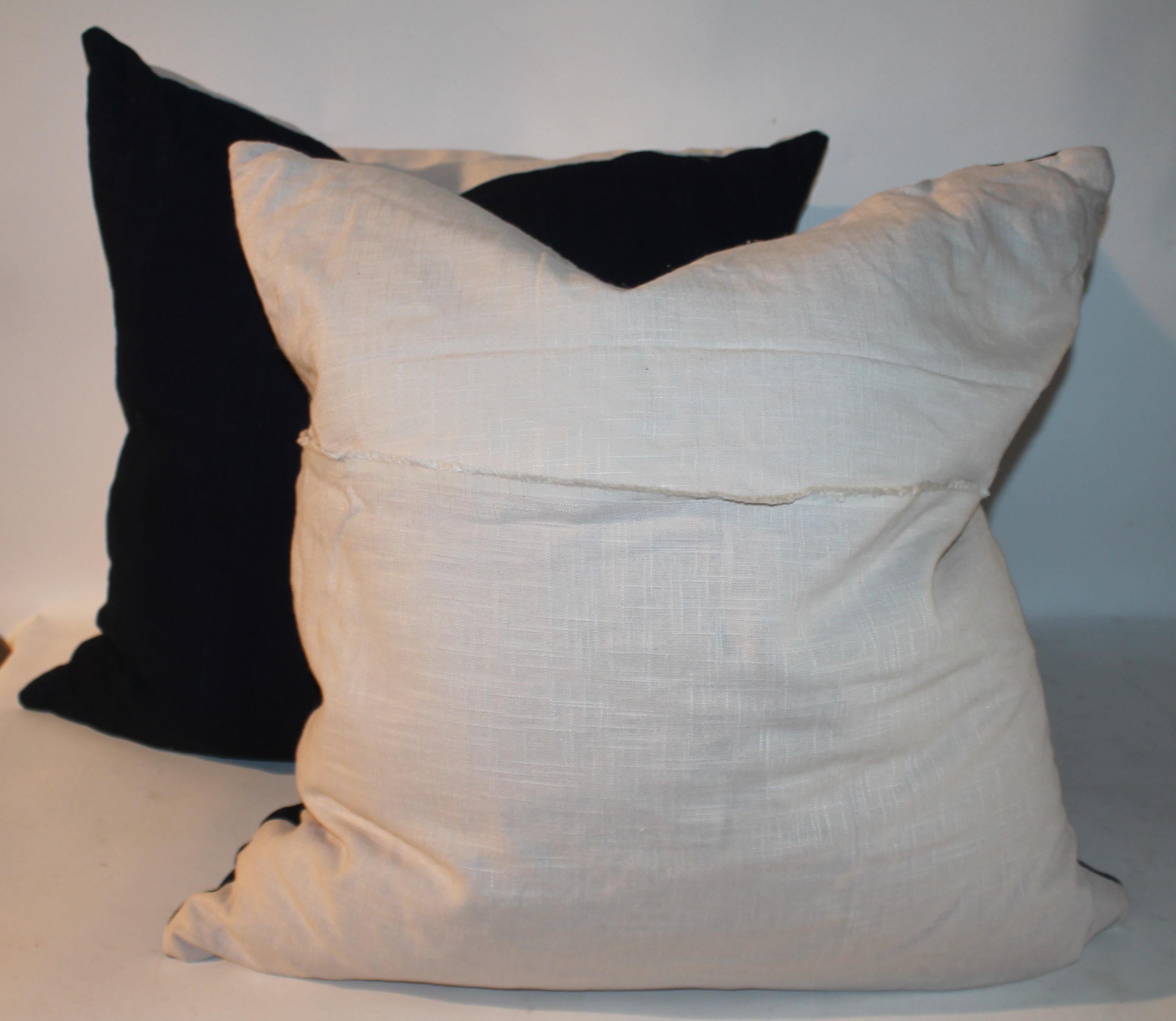 These amazing deep indigo linen pillows are amazing and a very nice soft hand woven linen. The backings are white homespun linen backings. The inserts are down & feather fill.Sold as a pair.