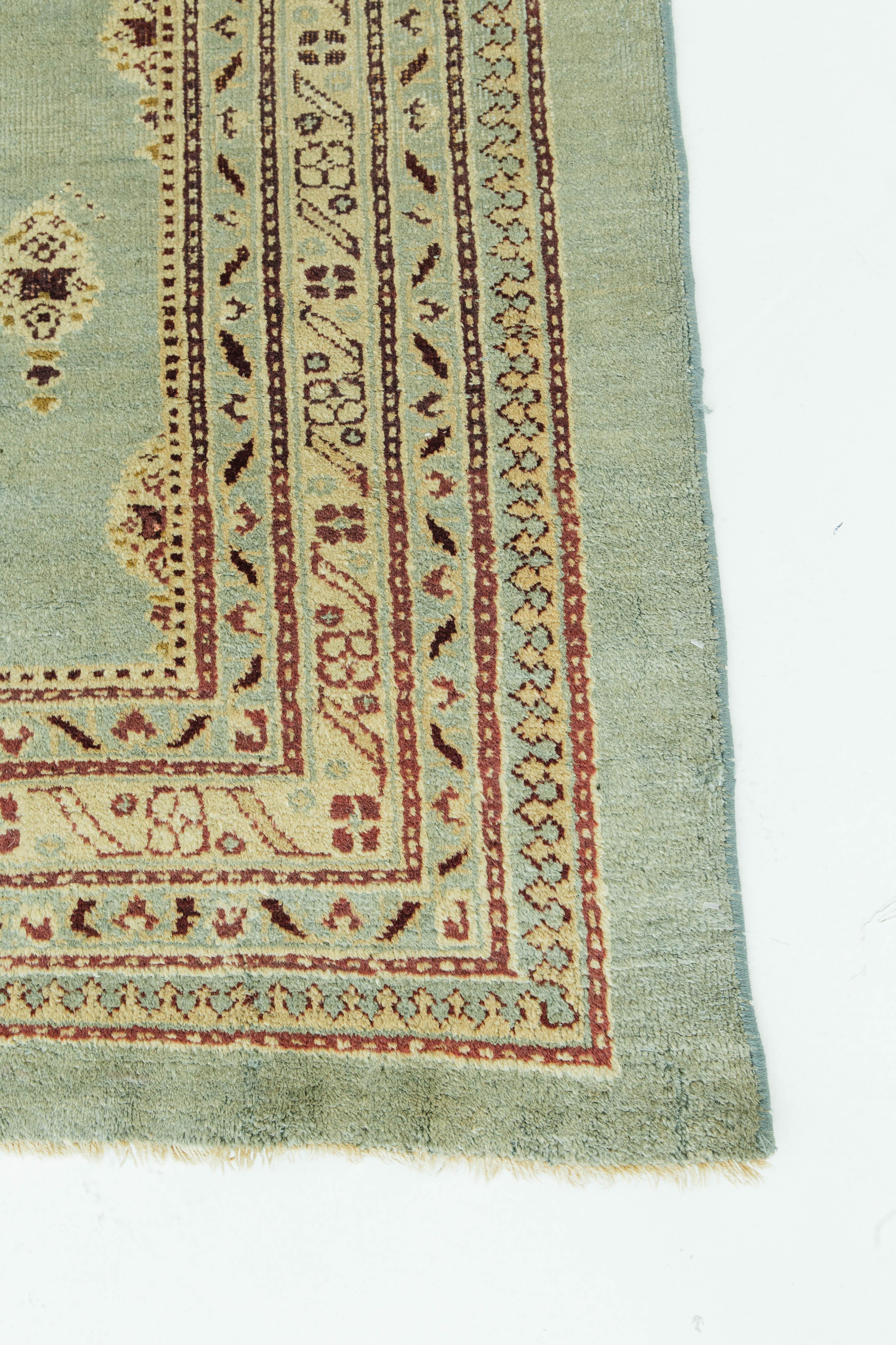 Our antique Indian Amritsar rug is from the Punjab region. As an area heavily populated by the Sikh religion, the influences are seen in this room sized rug. The beautiful greens of this rug will make any white or wood toned application an instant