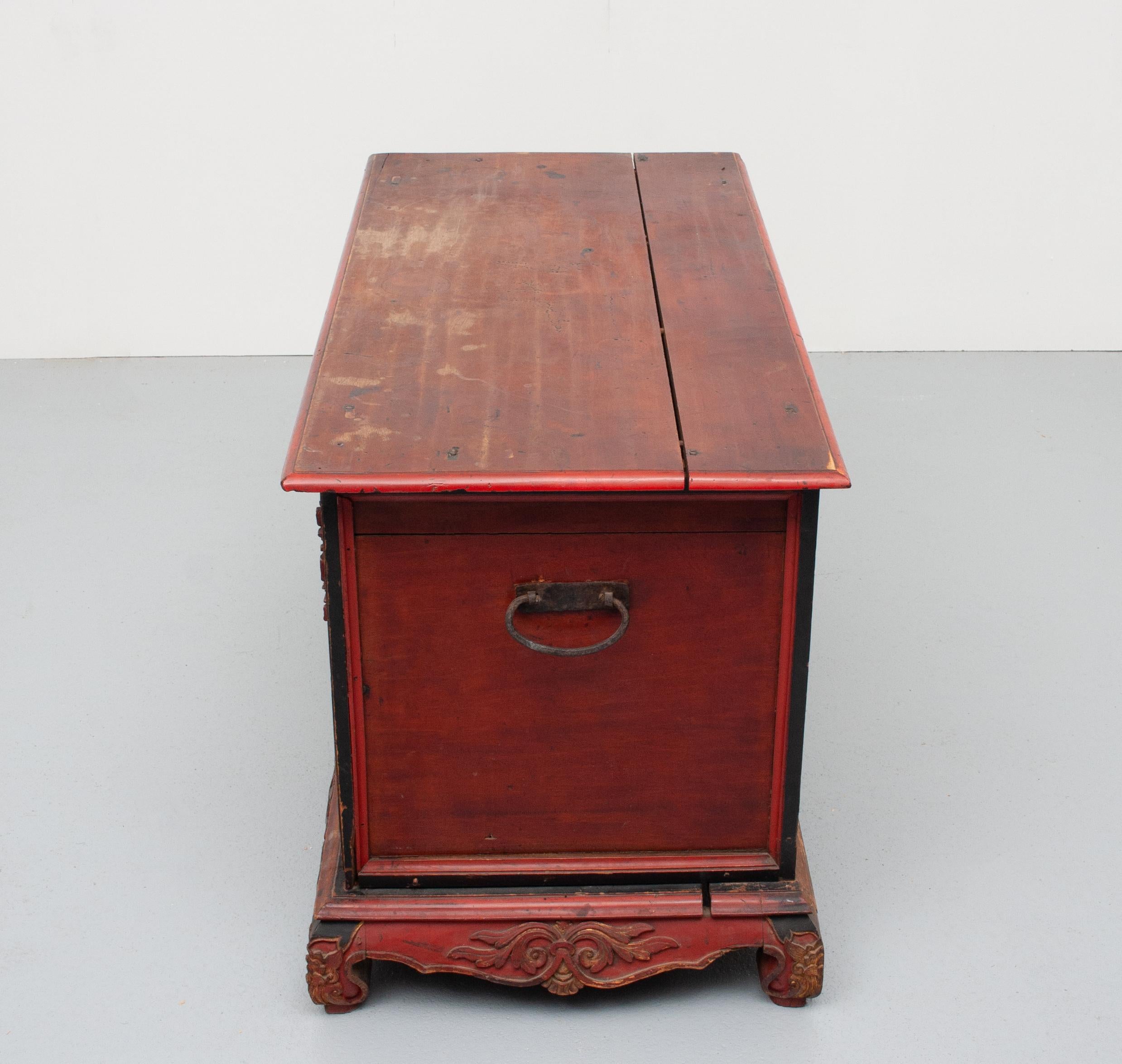 Indonesian hand carved blanked chest .!9 century . Cold on Red color .Three drawers . 
very nice decorative piece. 
