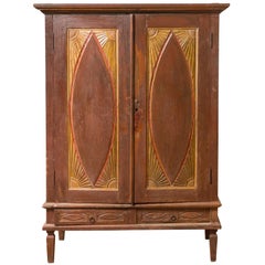 Antique Indonesian Cabinet with Carved Almond Style and Sun Ray Motifs