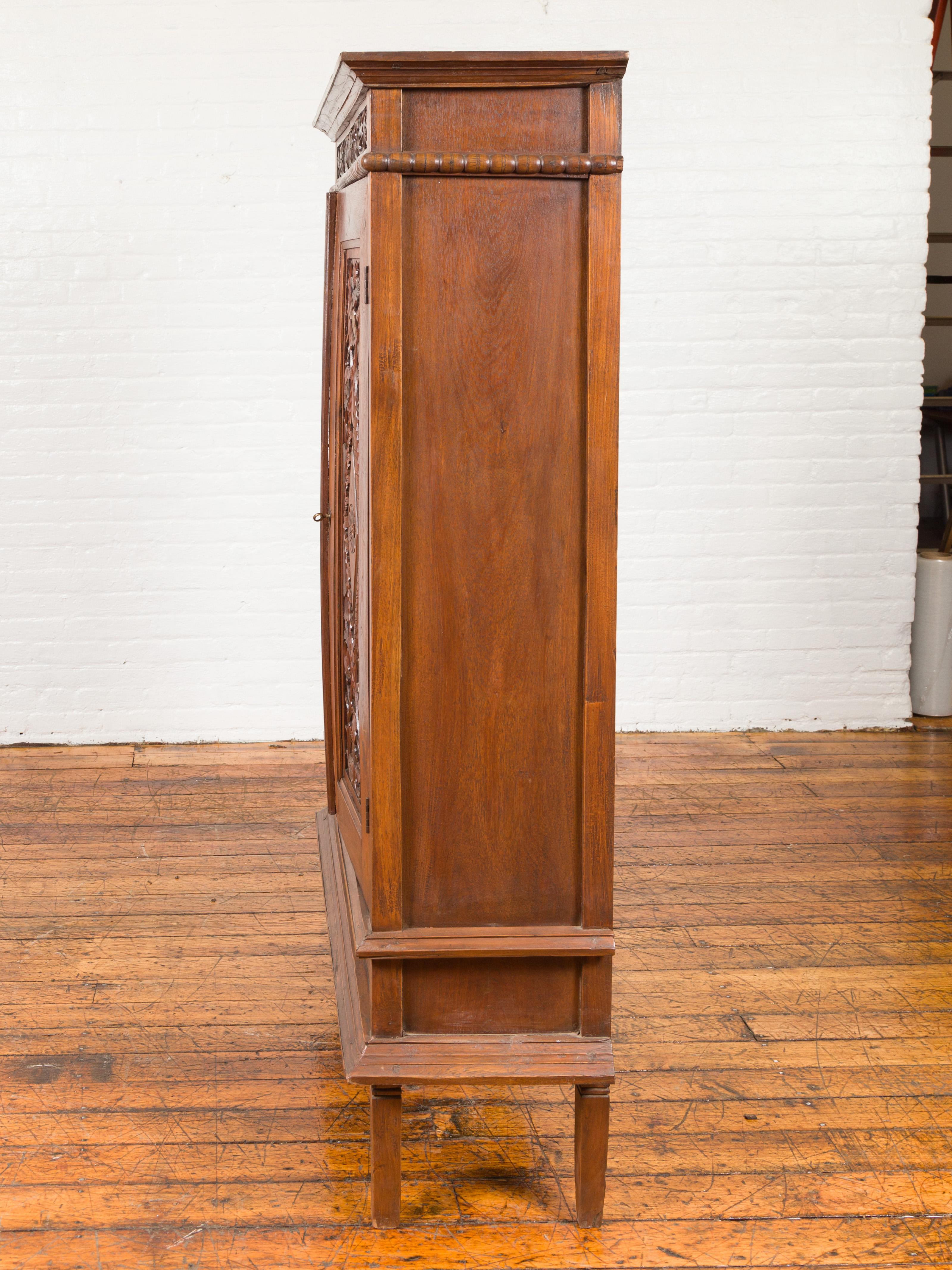 Antique Indonesian Cabinet with Carved Scrolling Foliage and Elongated Diamonds 10