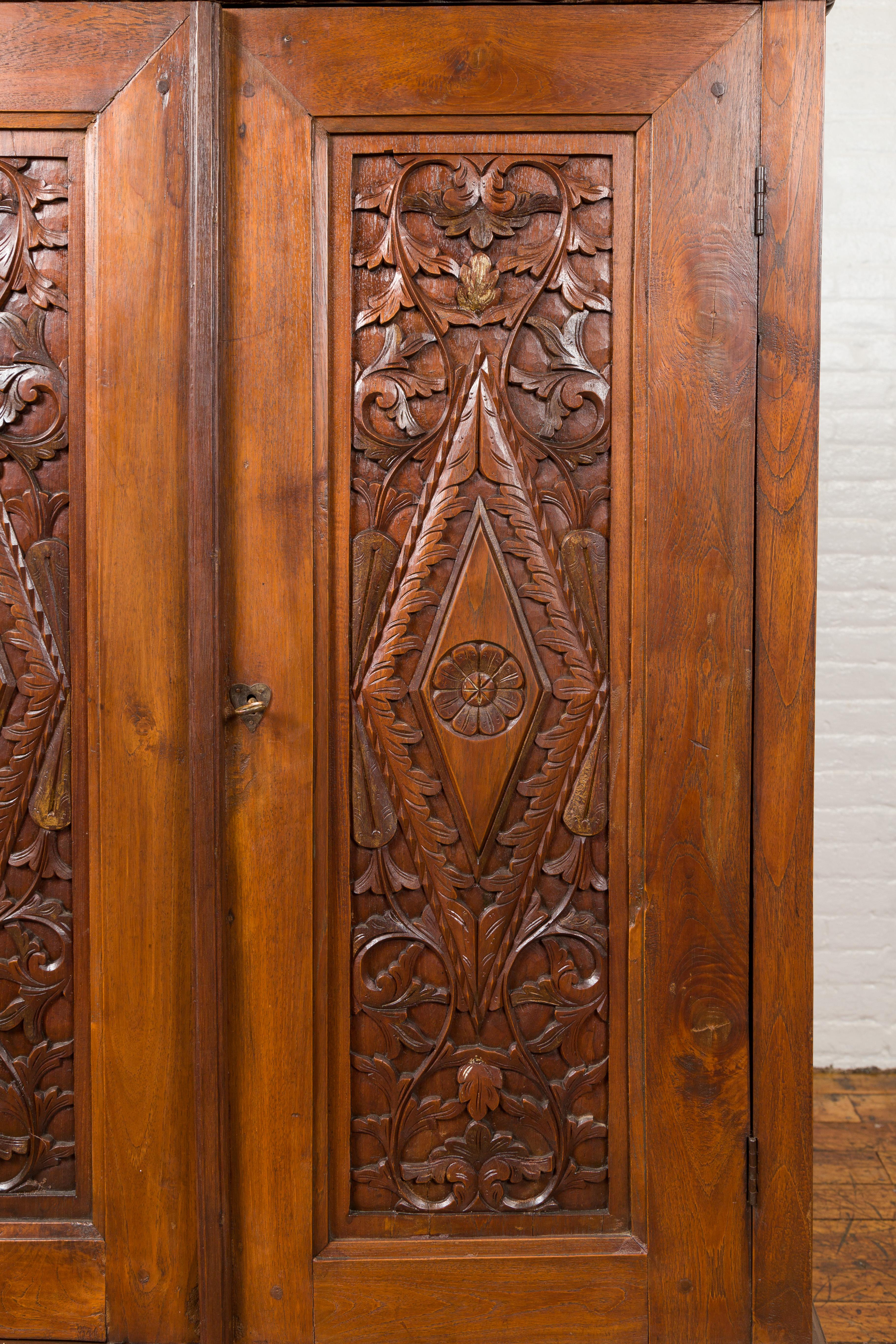 Antique Indonesian Cabinet with Carved Scrolling Foliage and Elongated Diamonds 2