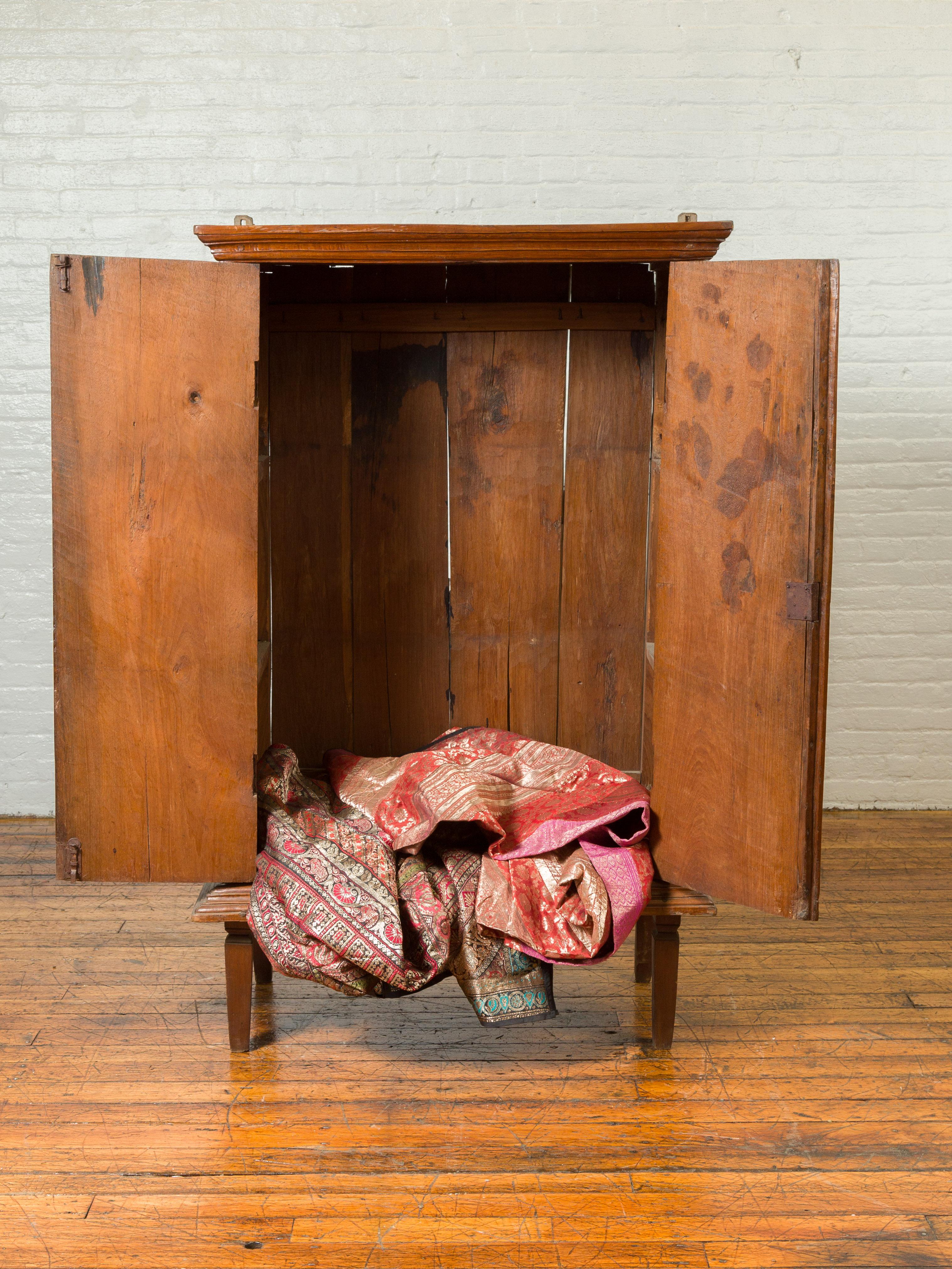 Indonesian Dutch Colonial Carved Wooden Cabinet with Diamonds and Radiating Motifs For Sale