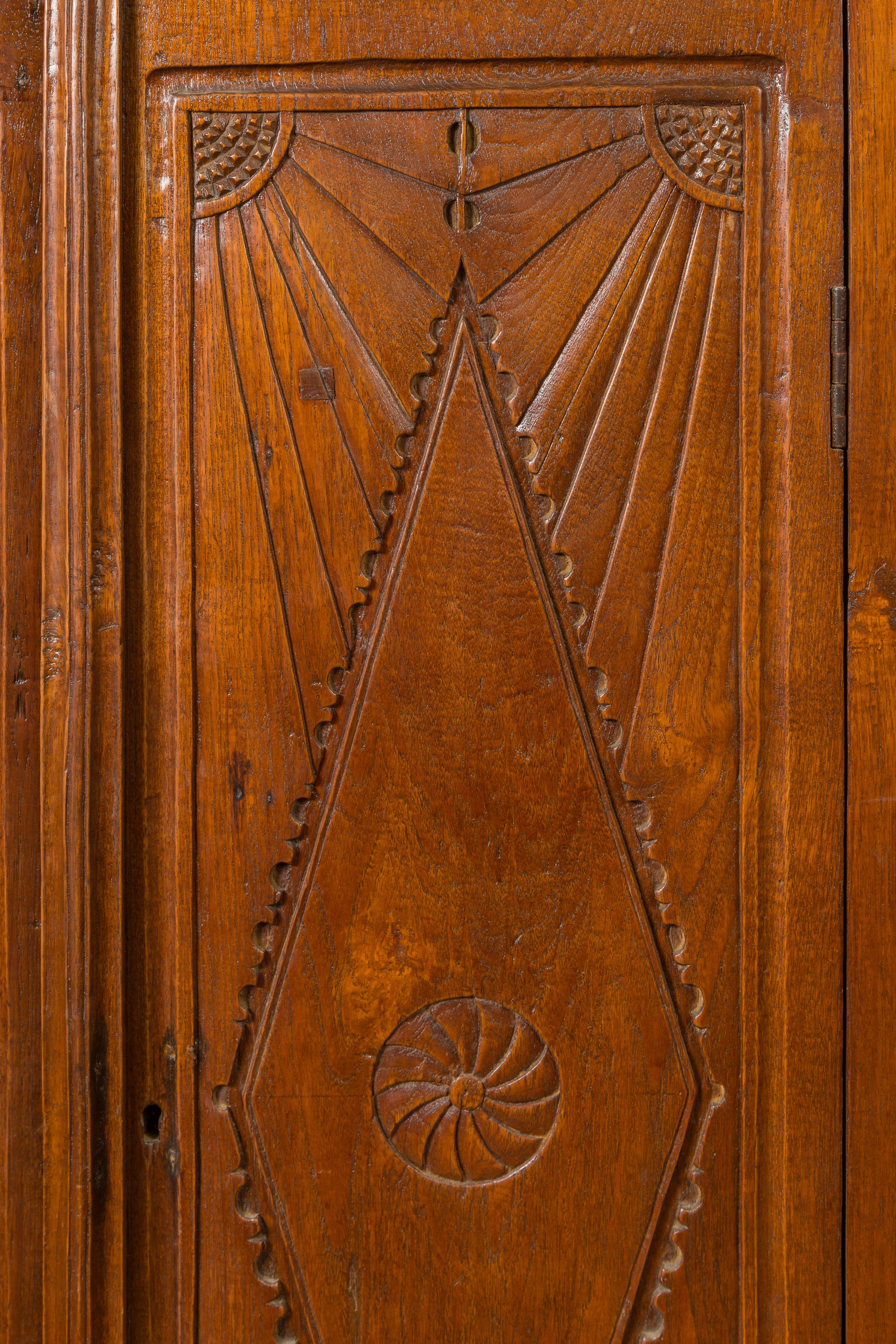 Dutch Colonial Carved Wooden Cabinet with Diamonds and Radiating Motifs For Sale 1