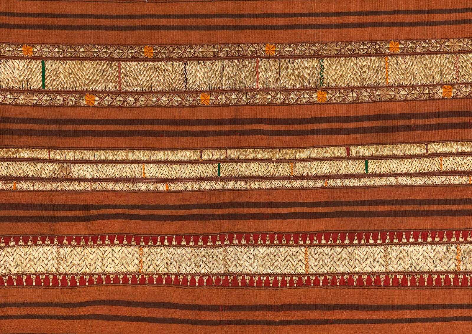Tapis, Woman’s Ceremonial Skirt
Paminggir people, Lampung, Sumatra, Indonesia
Late 19th or early 20th century
Silk, metallic thread, handspun cotton, natural and synthetic imported dyes, embroidery
46.5 x 23.25 inches  (118 x 59 cm)
