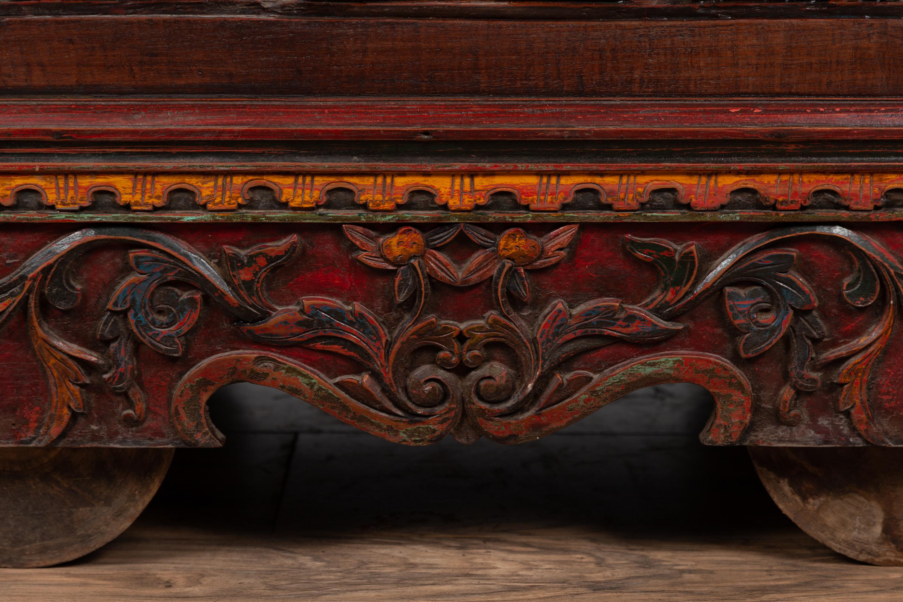 Antique Indonesian Hand Carved Blanket Chest with Polychrome Decor and Wheels 6