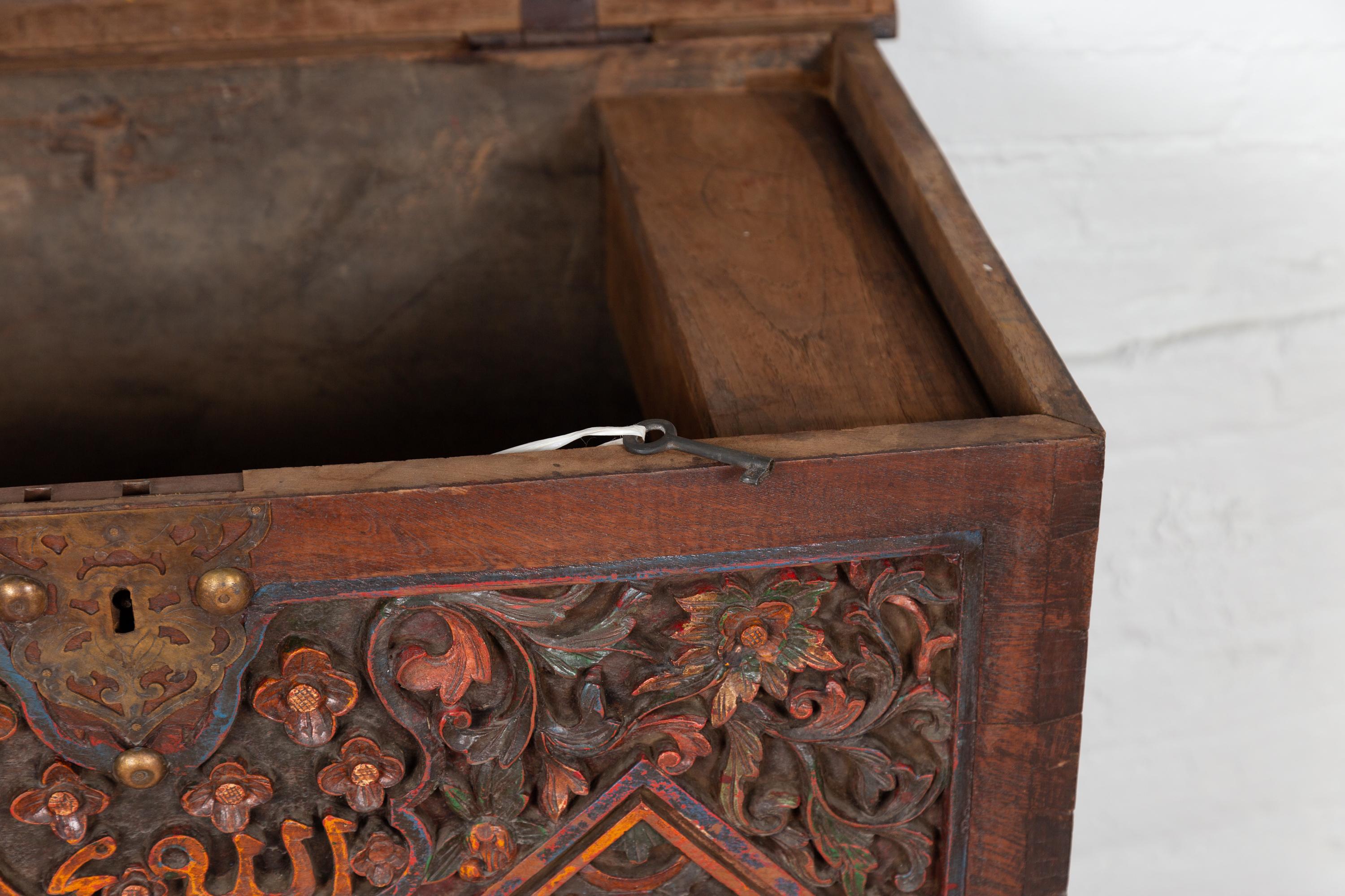 Antique Indonesian Hand Carved Blanket Chest with Polychrome Decor and Wheels 10