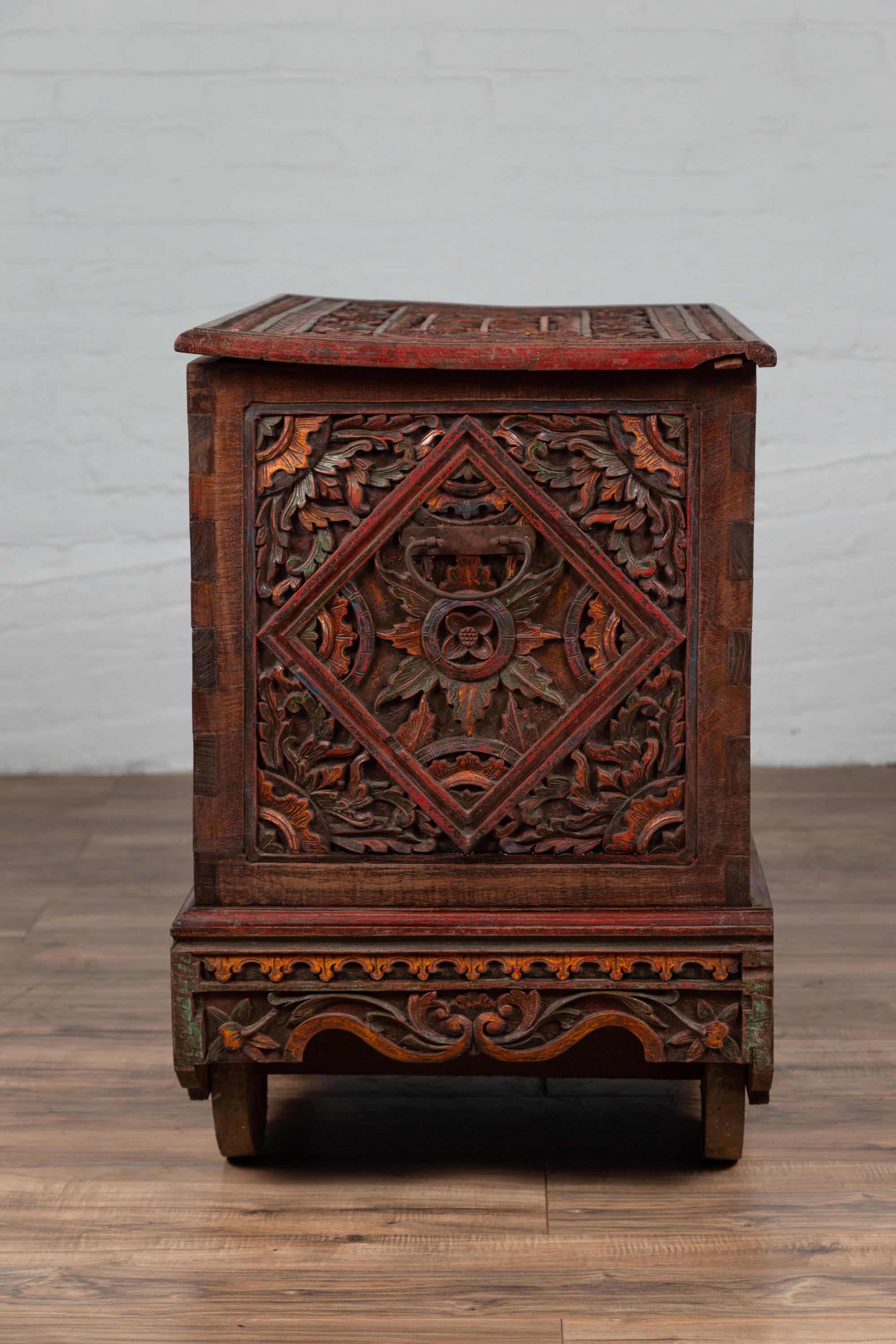 Hand-Carved Antique Indonesian Hand Carved Blanket Chest with Polychrome Design and Wheels